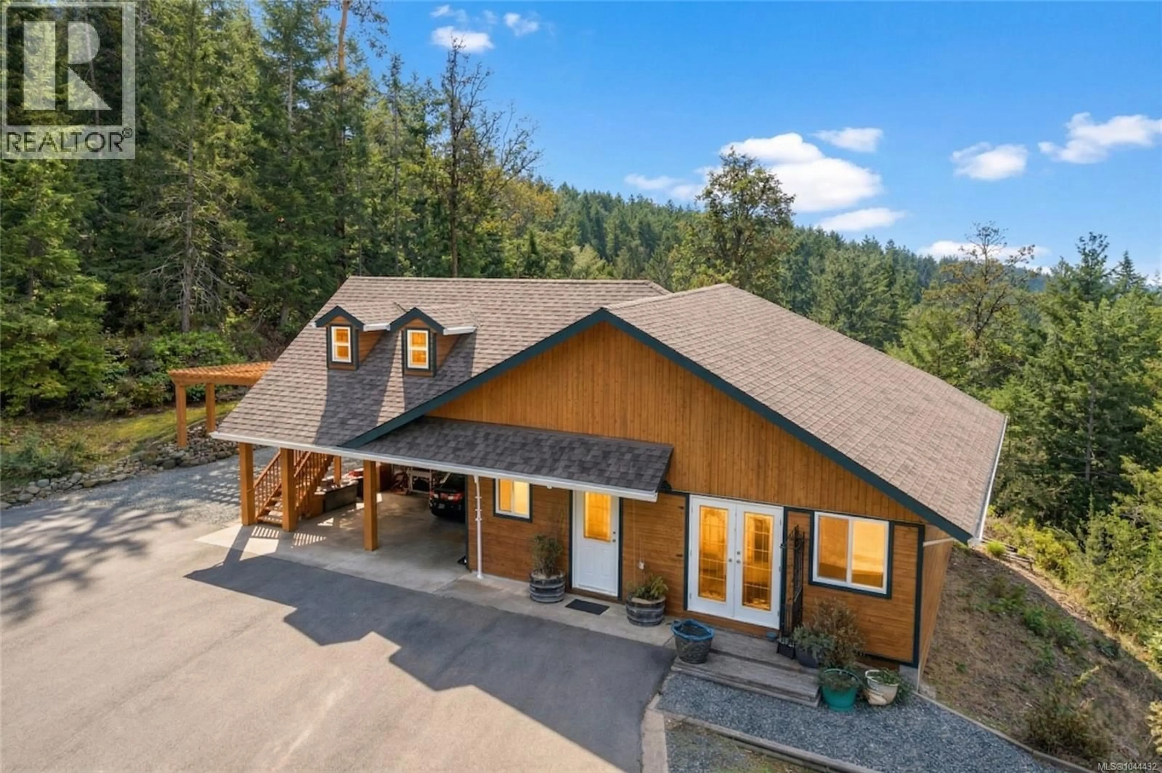 A pic from outside/outdoor area/front of a property/back of a property/a pic from drone, mountain view for 1990 RENA ROAD, Nanoose Bay British Columbia V9P9B1