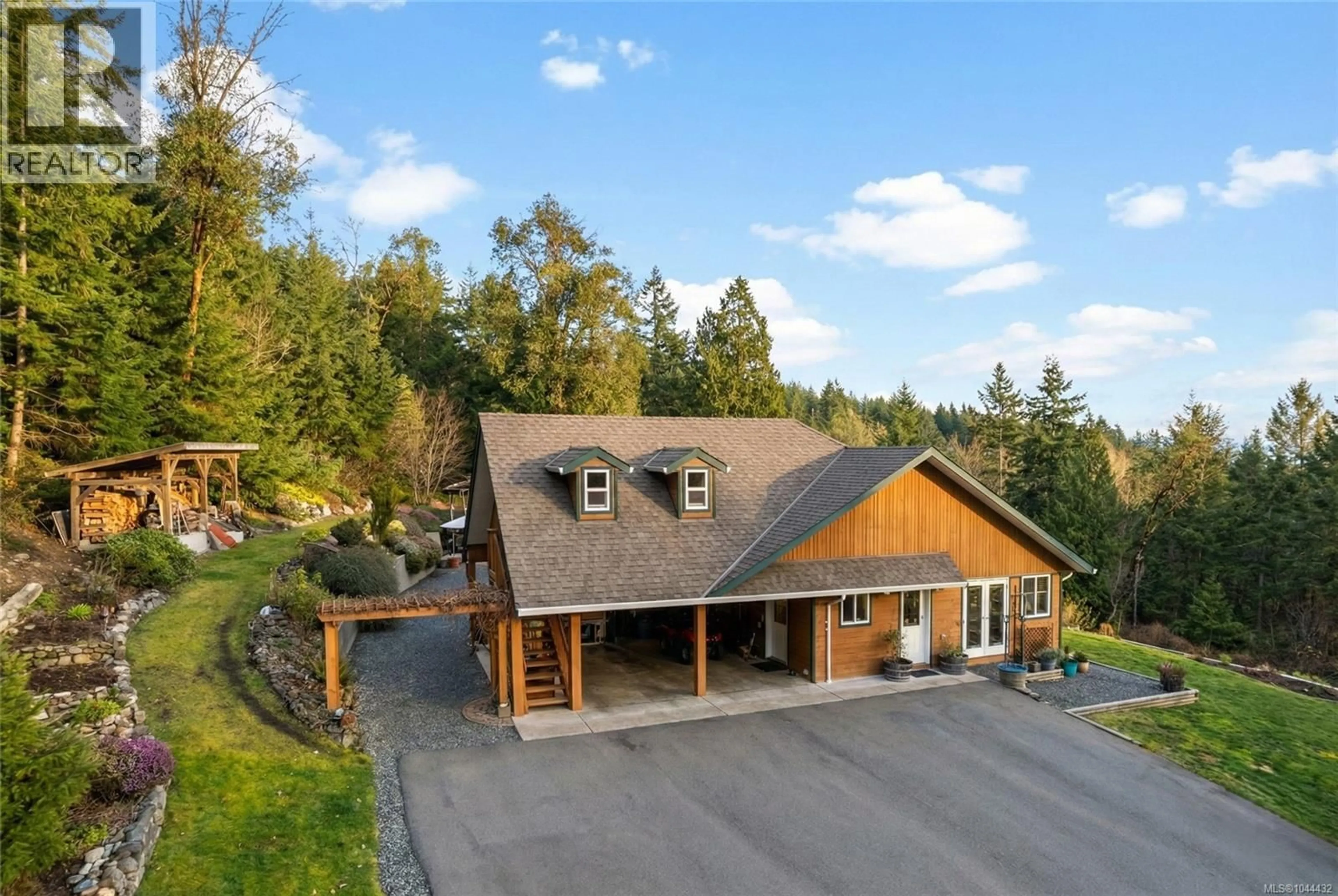 A pic from outside/outdoor area/front of a property/back of a property/a pic from drone, unknown for 1990 RENA ROAD, Nanoose Bay British Columbia V9P9B1
