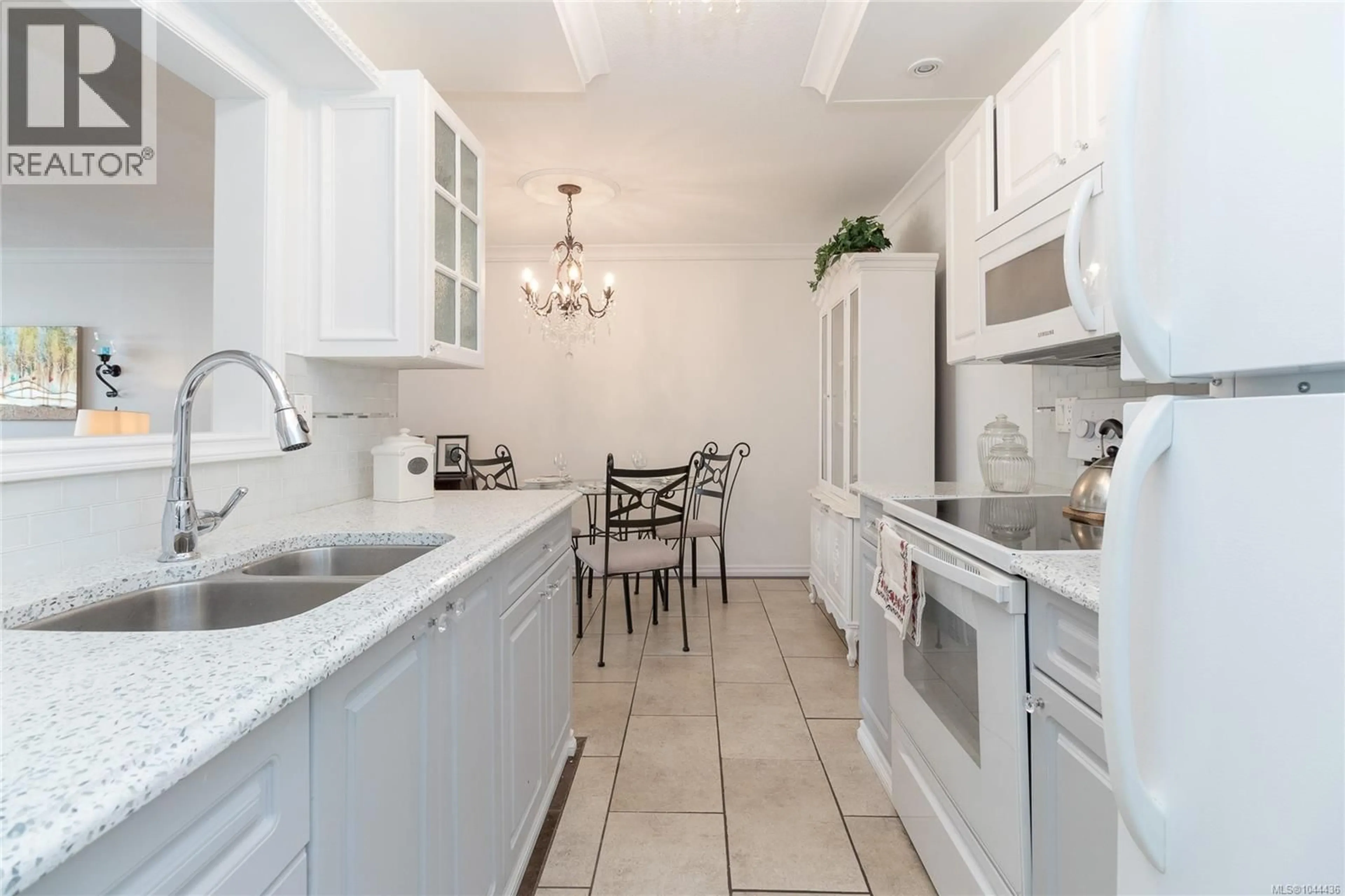 Standard kitchen, ceramic/tile floor for 111 - 2050 WHITE BIRCH ROAD, Sidney British Columbia V8L2R1