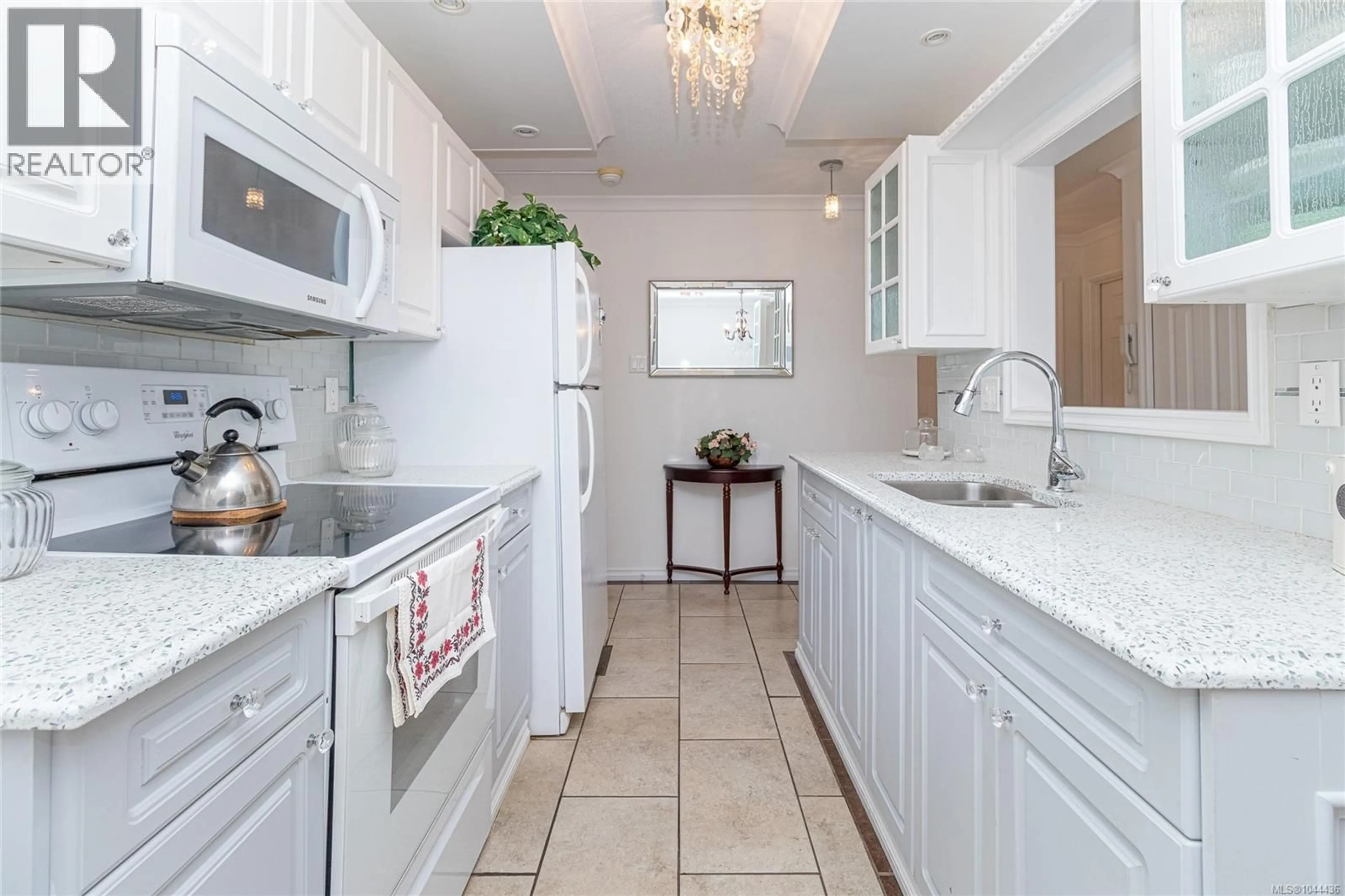 Standard kitchen, ceramic/tile floor for 111 - 2050 WHITE BIRCH ROAD, Sidney British Columbia V8L2R1