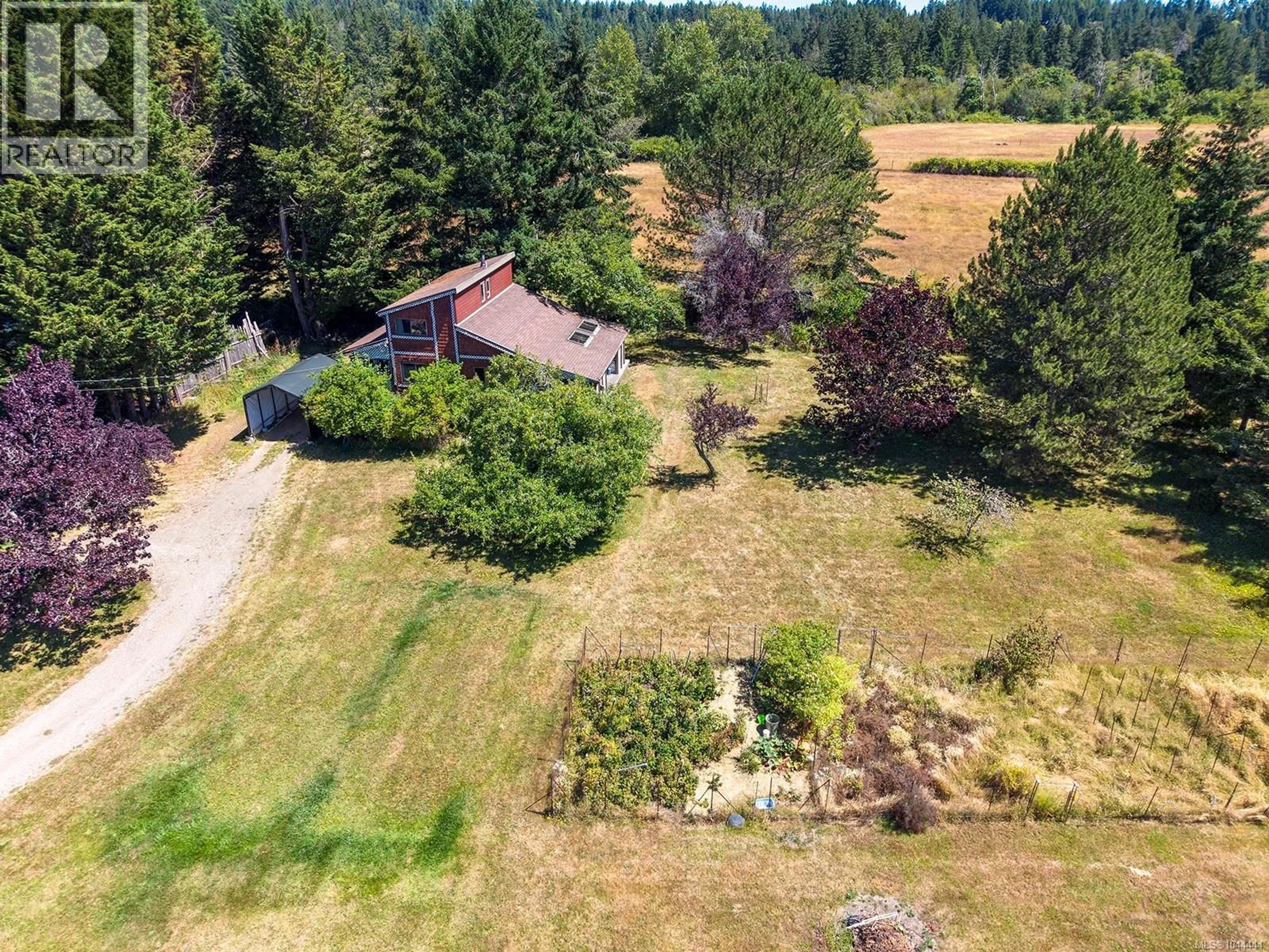 A pic from outside/outdoor area/front of a property/back of a property/a pic from drone, forest/trees view for 2570 PIERCY ROAD, Denman Island British Columbia V0R1T0