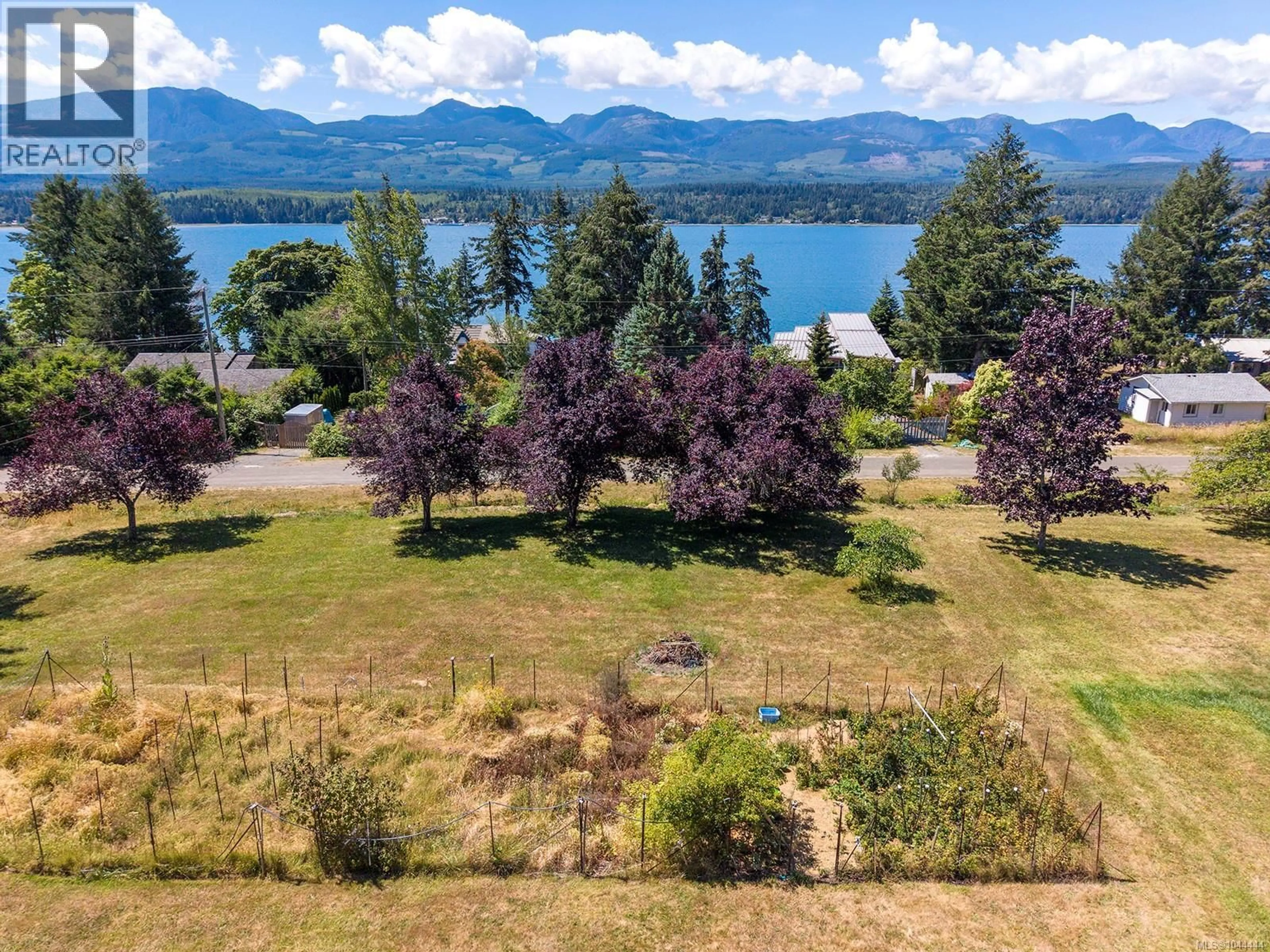 A pic from outside/outdoor area/front of a property/back of a property/a pic from drone, water/lake/river/ocean view for 2570 PIERCY ROAD, Denman Island British Columbia V0R1T0