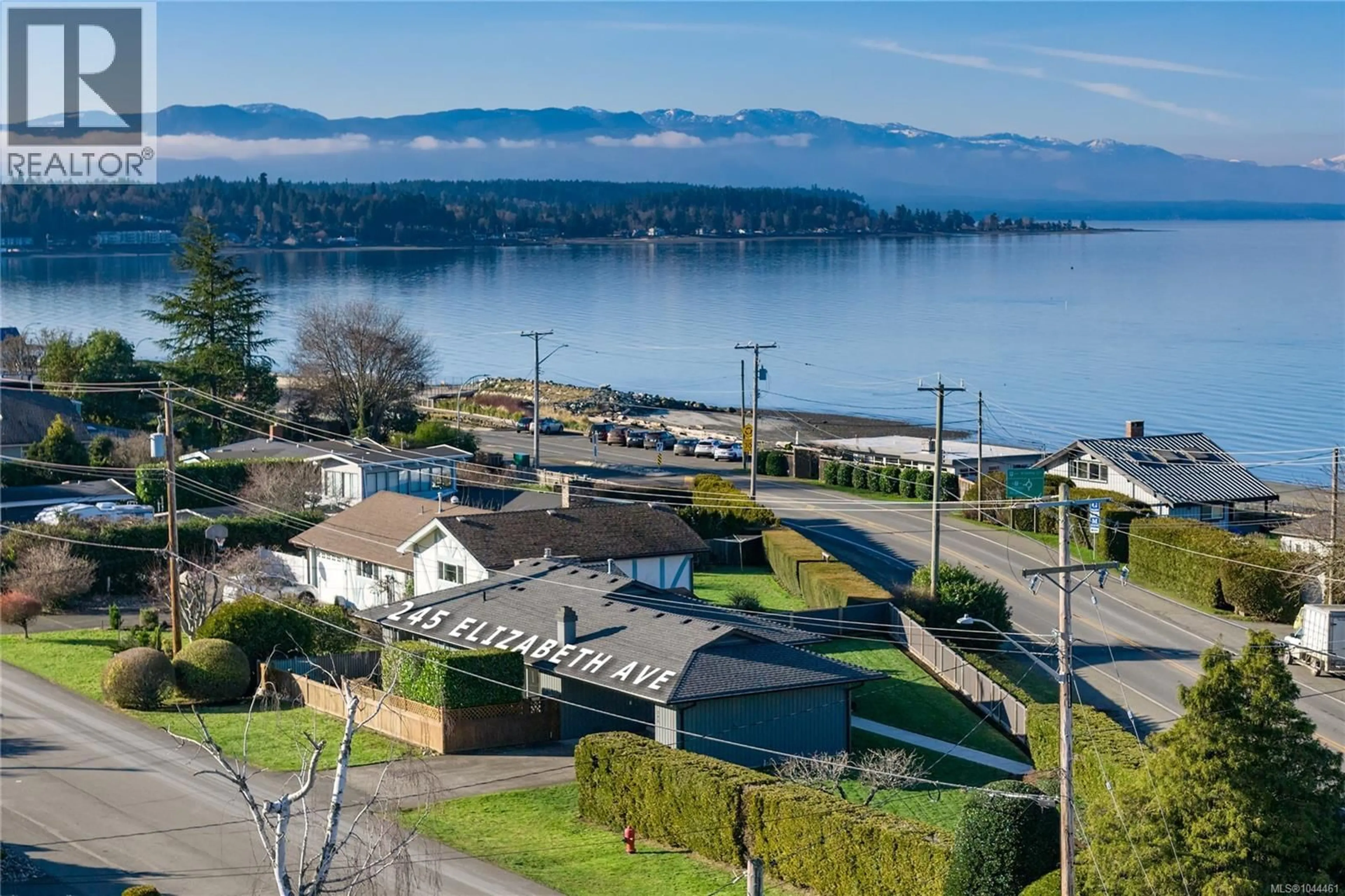 A pic from outside/outdoor area/front of a property/back of a property/a pic from drone, water/lake/river/ocean view for 245 ELIZABETH AVENUE, Qualicum Beach British Columbia V9K1G8