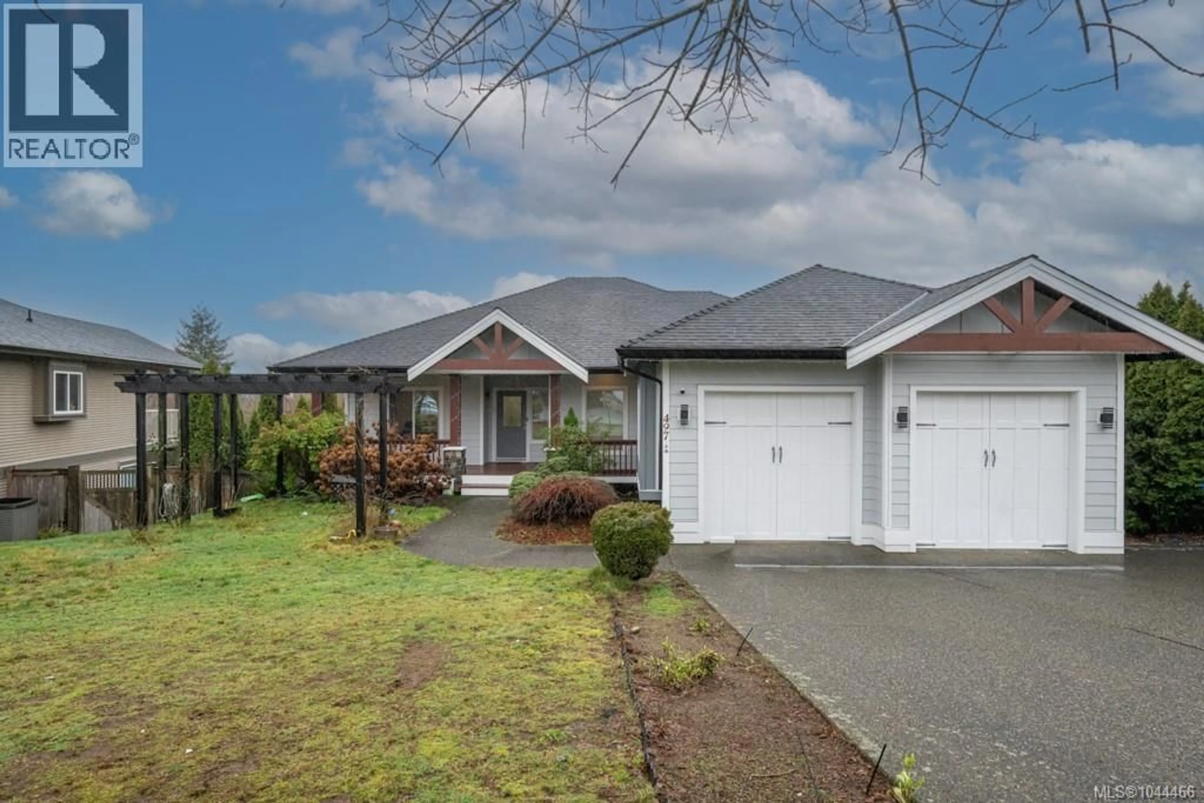 A pic from outside/outdoor area/front of a property/back of a property/a pic from drone, street for 497 POETS TRAIL DRIVE, Nanaimo British Columbia V9R7C5
