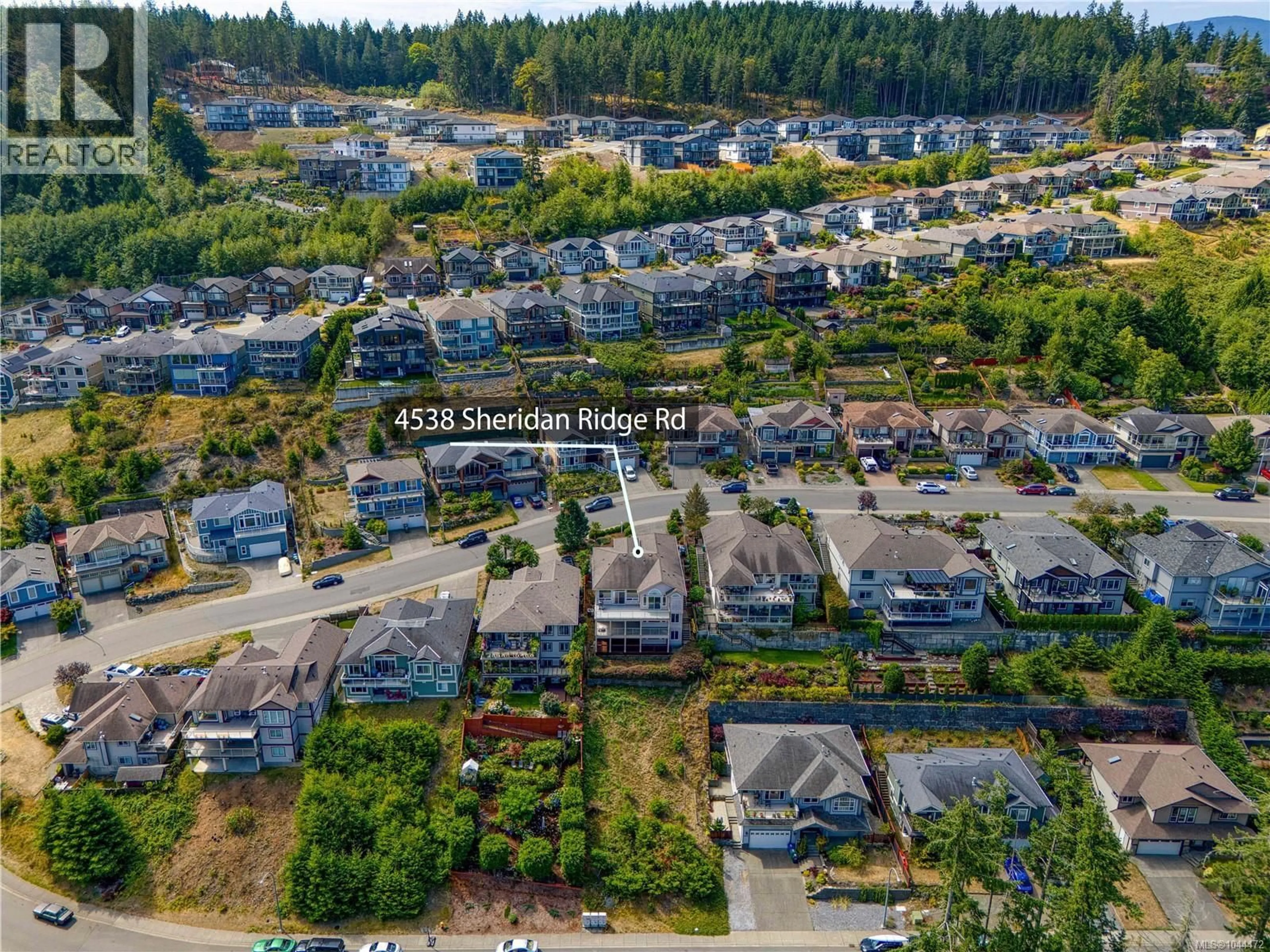 A pic from outside/outdoor area/front of a property/back of a property/a pic from drone, street for 4538 SHERIDAN RIDGE ROAD, Nanaimo British Columbia V9T6S7