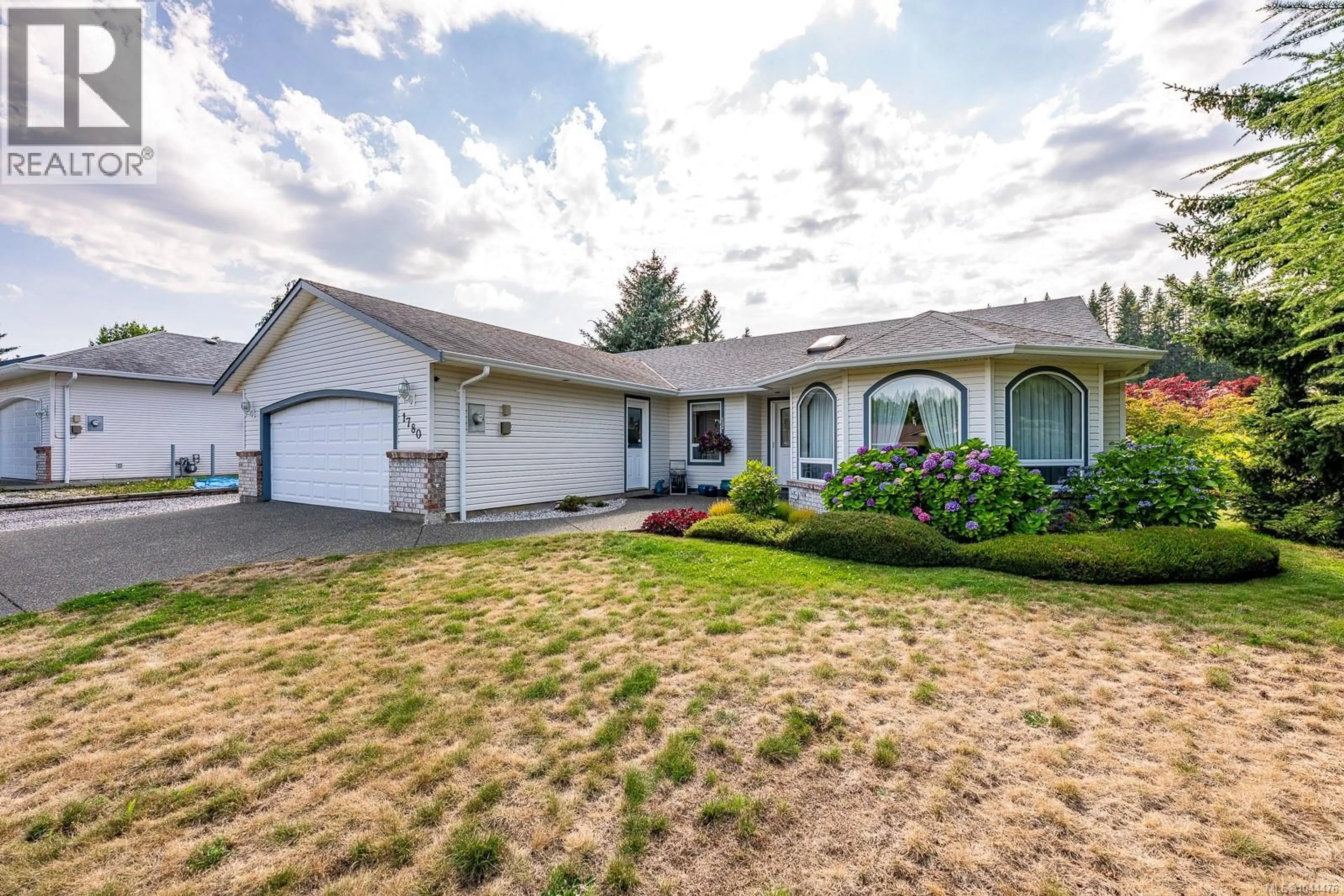 Home with vinyl exterior material, street for 1780 VALLEY VIEW DRIVE, Courtenay British Columbia V9N8S4