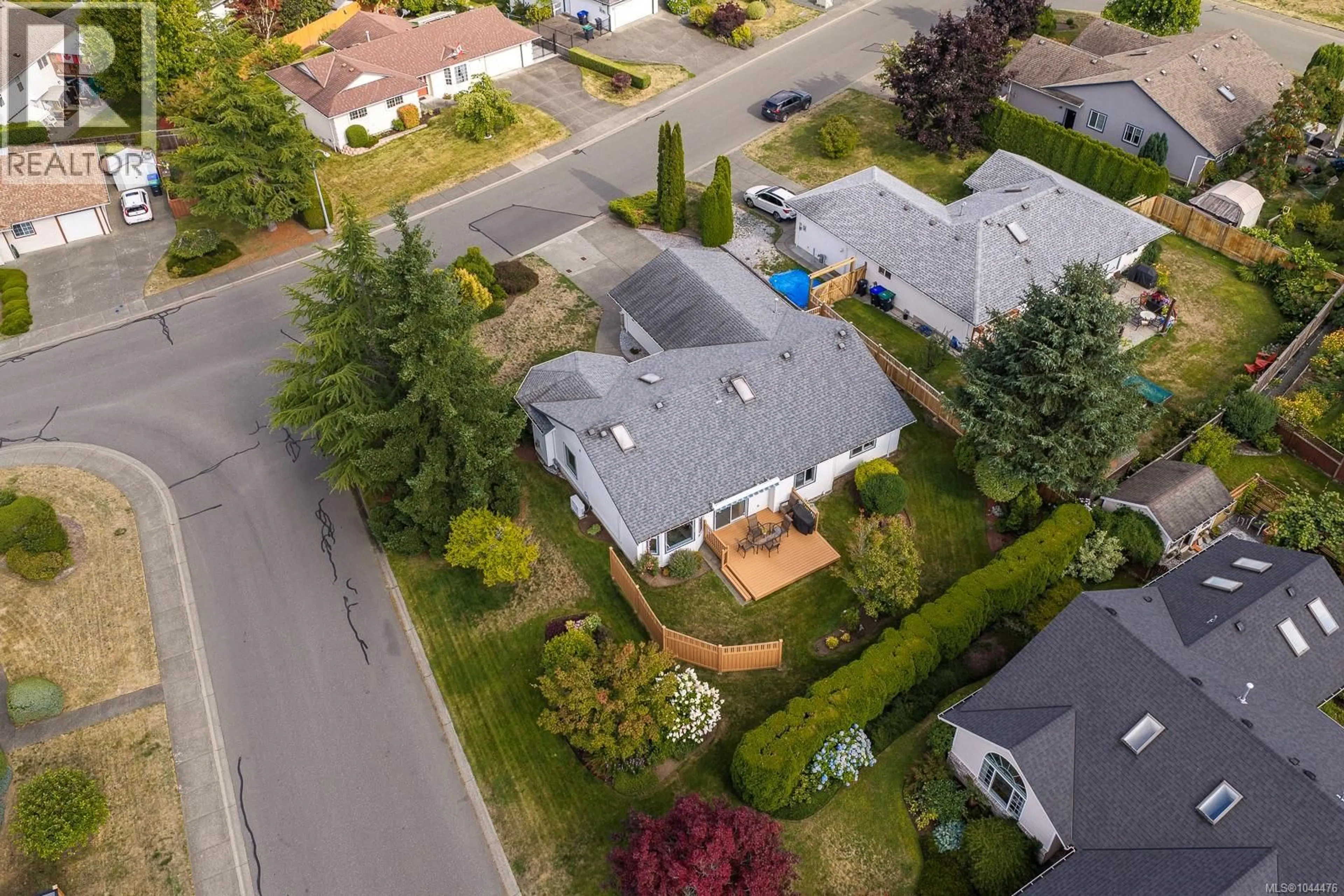 A pic from outside/outdoor area/front of a property/back of a property/a pic from drone, street for 1780 VALLEY VIEW DRIVE, Courtenay British Columbia V9N8S4