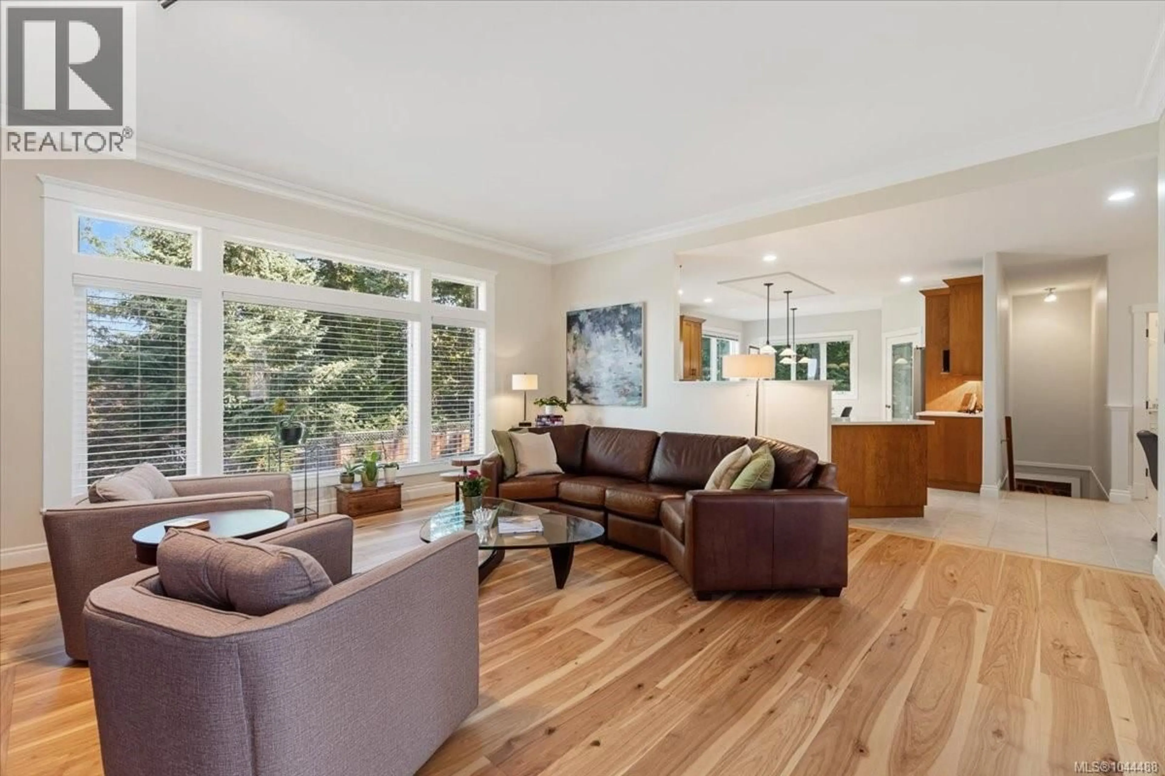 Living room with furniture, wood/laminate floor for 609 MEADOW DRIVE, Qualicum Beach British Columbia V9K2T2