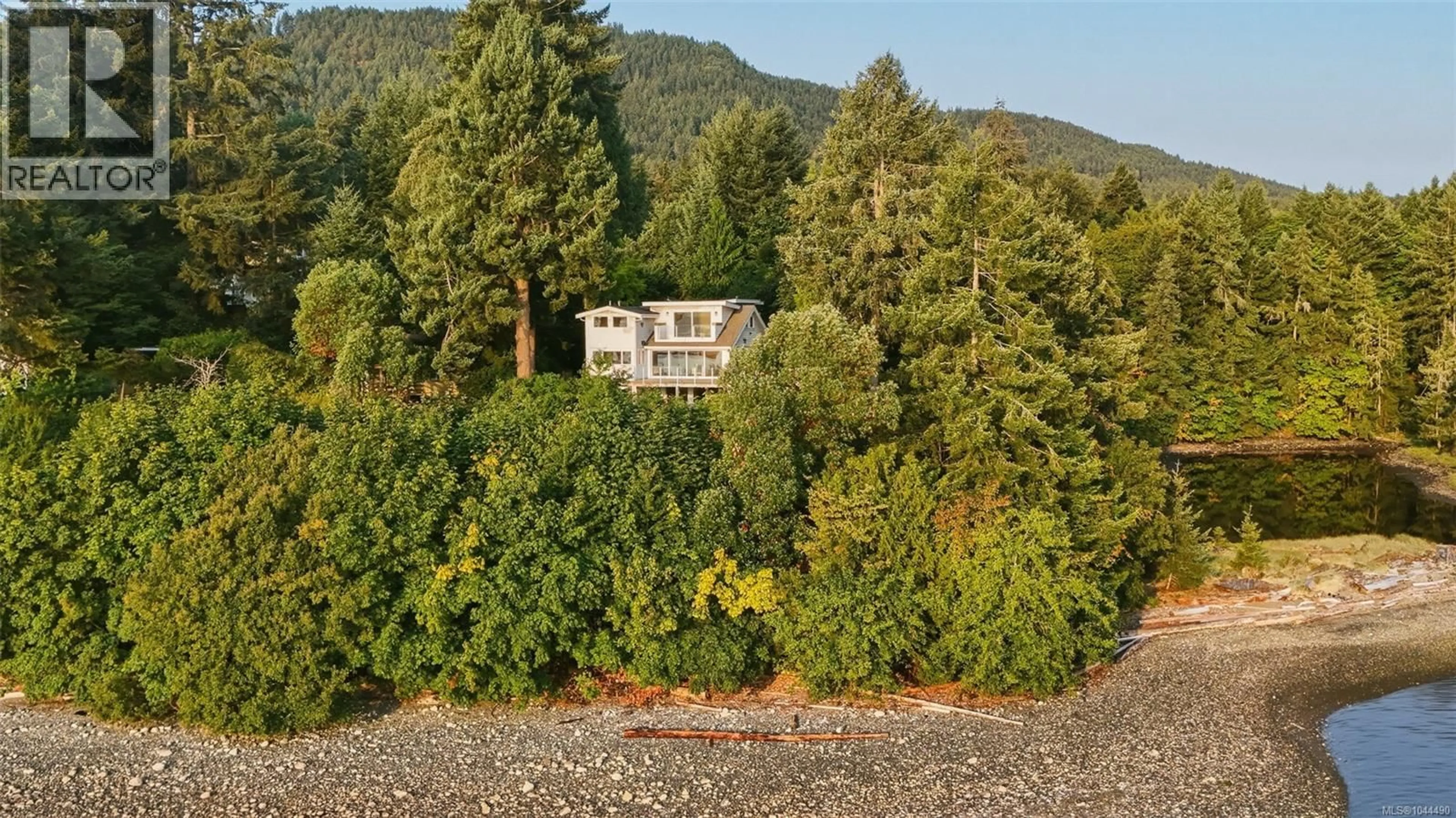A pic from outside/outdoor area/front of a property/back of a property/a pic from drone, forest/trees view for 312 ROLAND ROAD, Ladysmith British Columbia V9G1X8