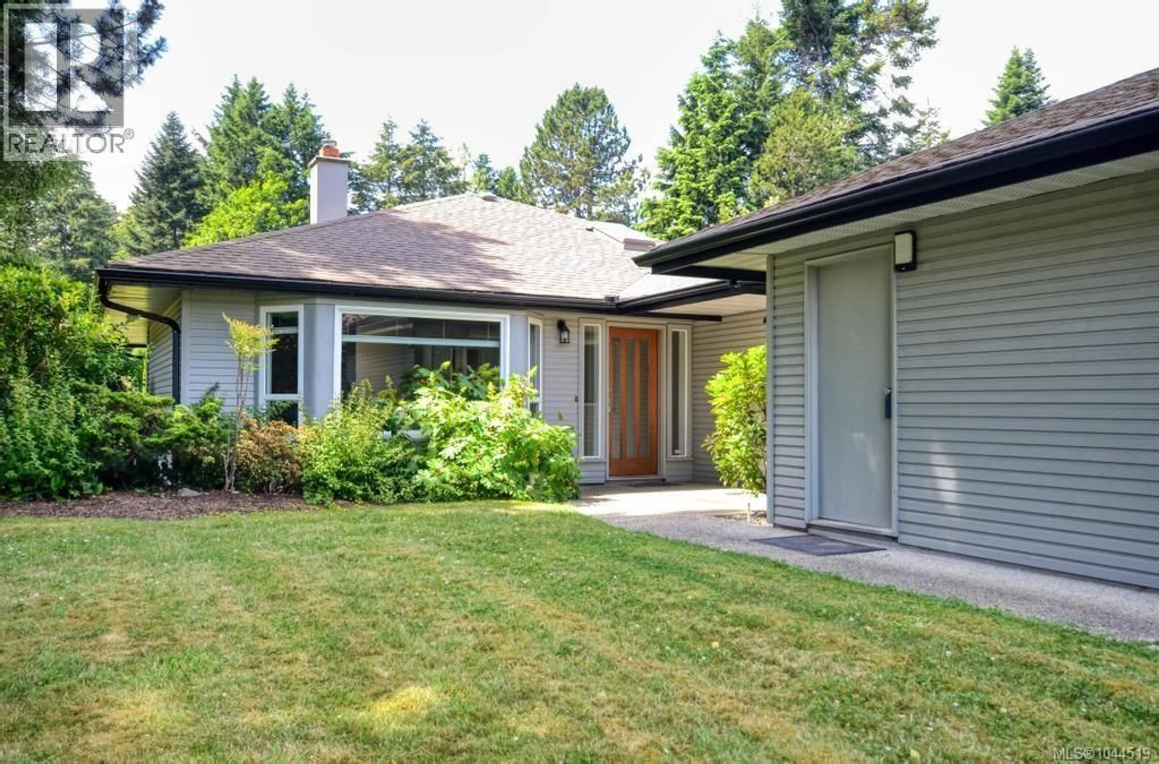 Home with brick exterior material, street for 6 - 4630 LOCHSIDE DRIVE, Saanich British Columbia V8Y2T1