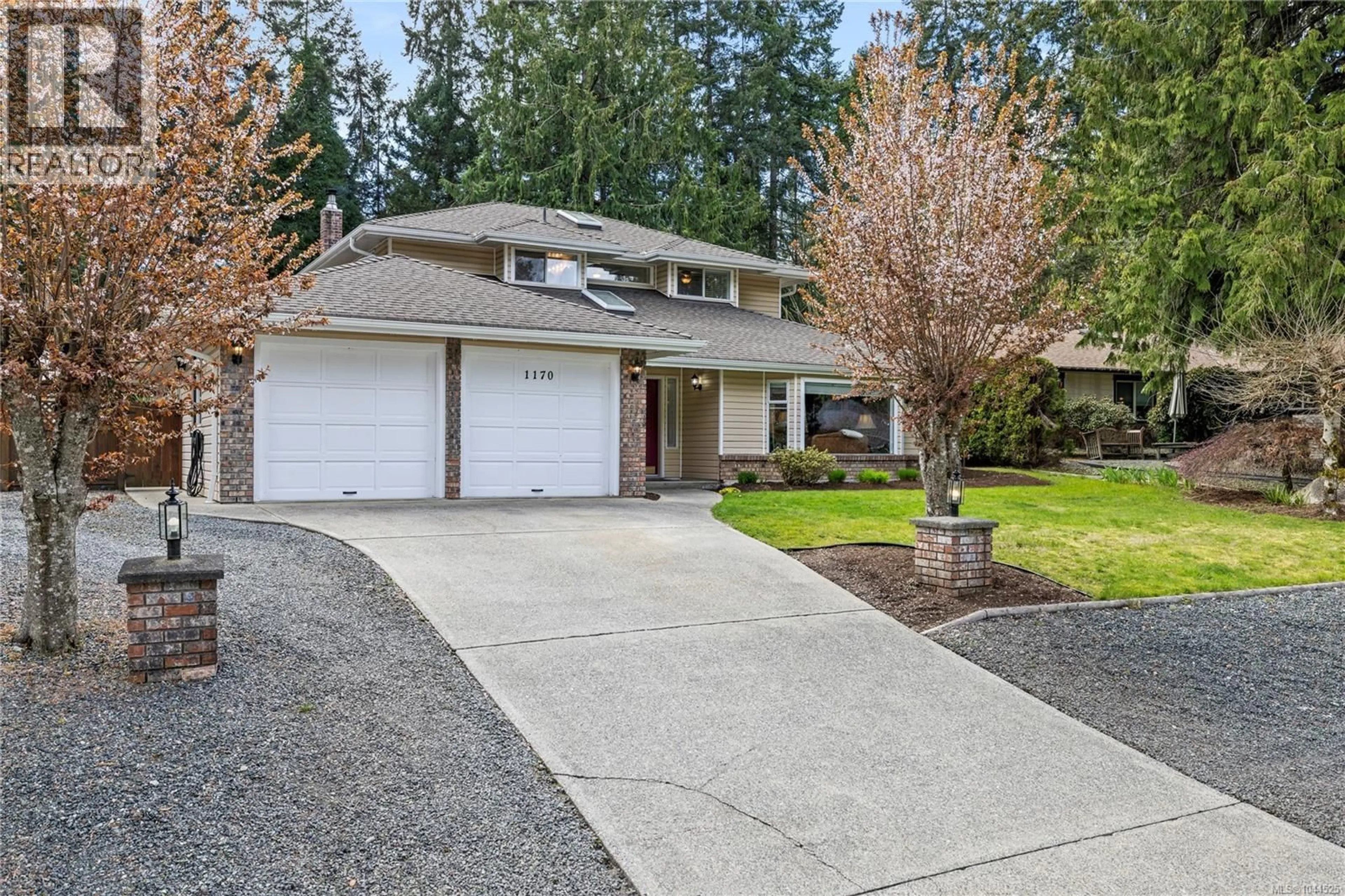Home with vinyl exterior material, street for 1170 CLUBHOUSE DRIVE, Qualicum Beach British Columbia V9K1C4