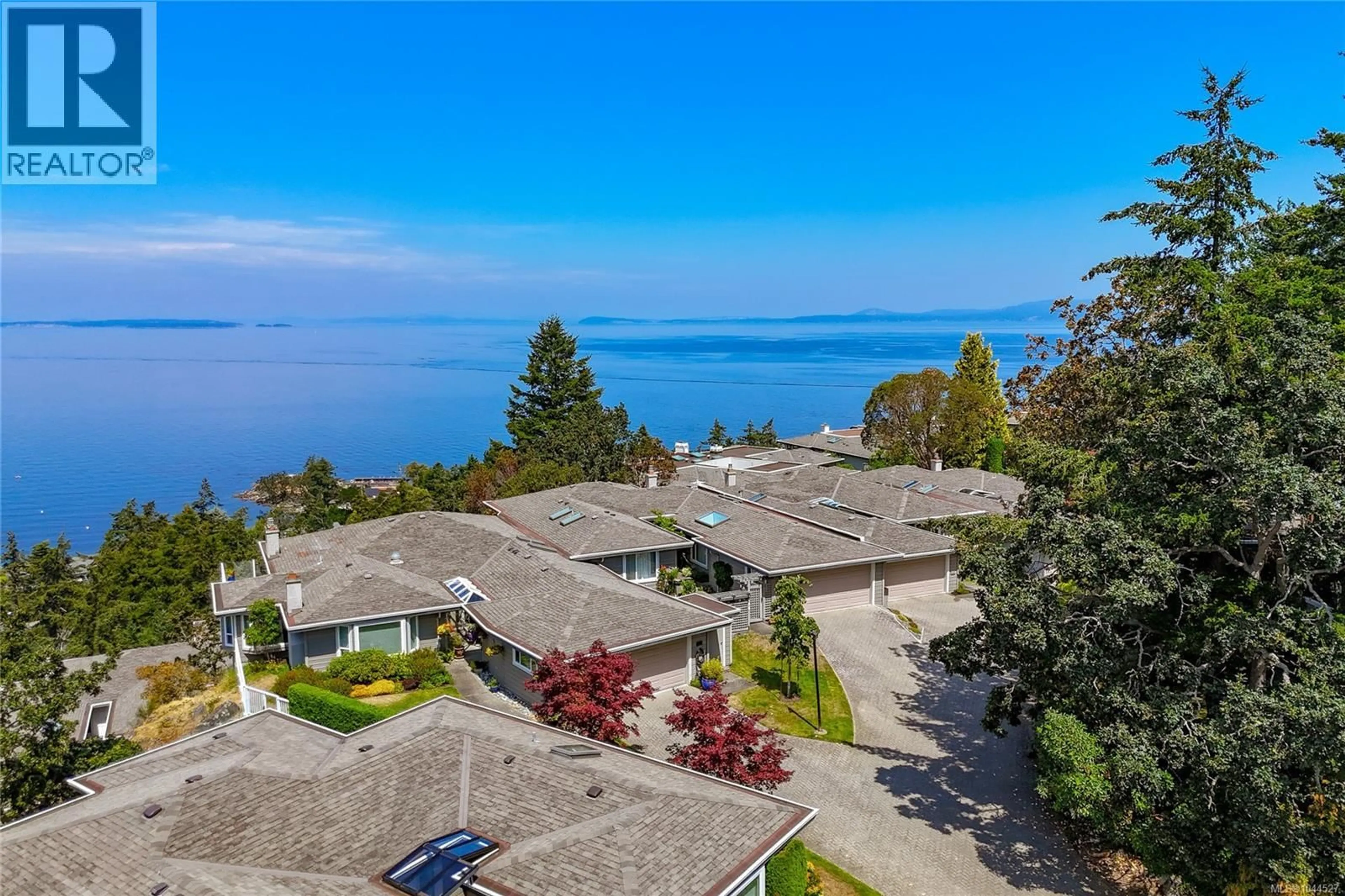 A pic from outside/outdoor area/front of a property/back of a property/a pic from drone, water/lake/river/ocean view for 607 - 2829 ARBUTUS ROAD, Saanich British Columbia V8N5X5