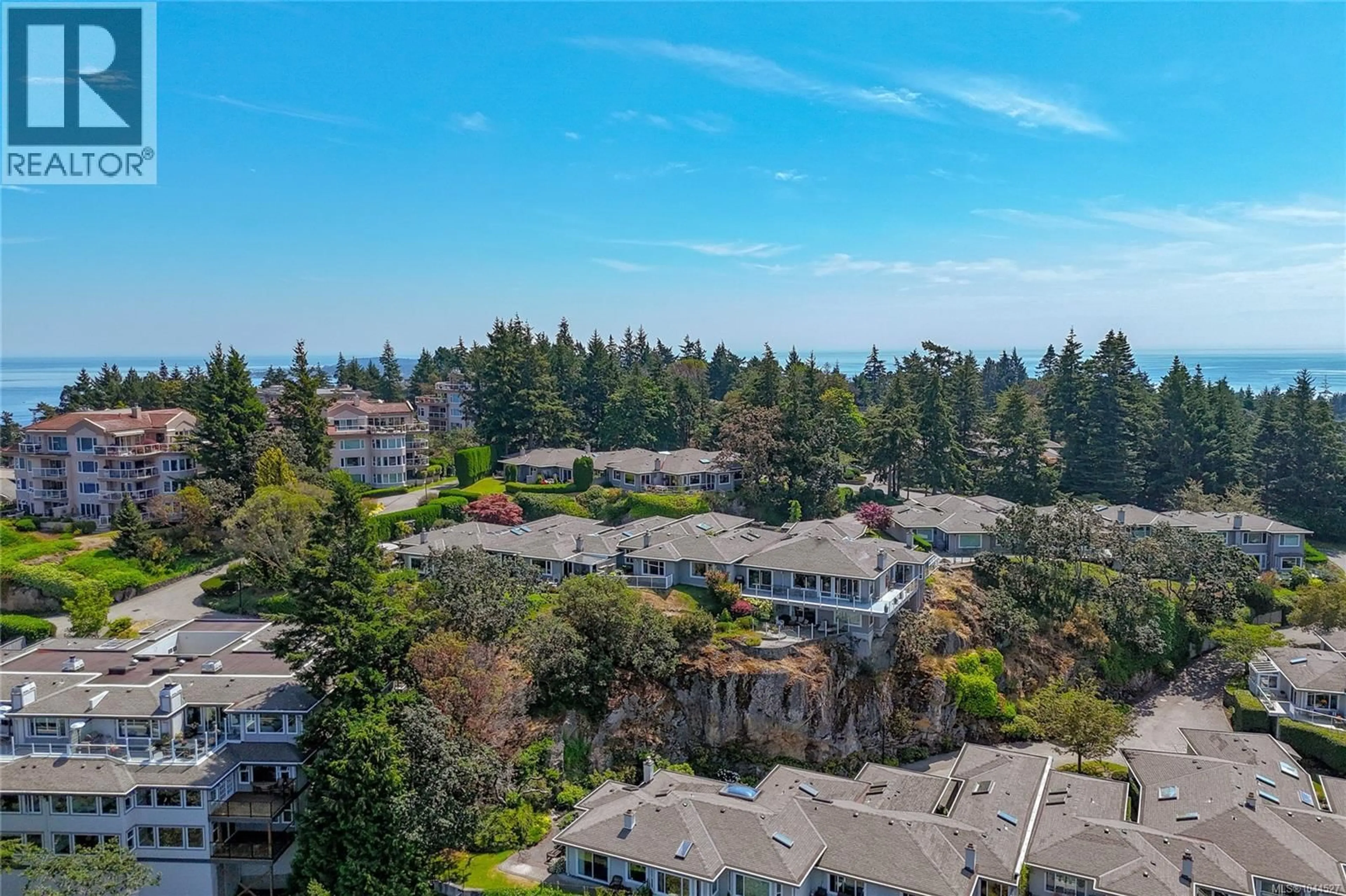 A pic from outside/outdoor area/front of a property/back of a property/a pic from drone, water/lake/river/ocean view for 607 - 2829 ARBUTUS ROAD, Saanich British Columbia V8N5X5