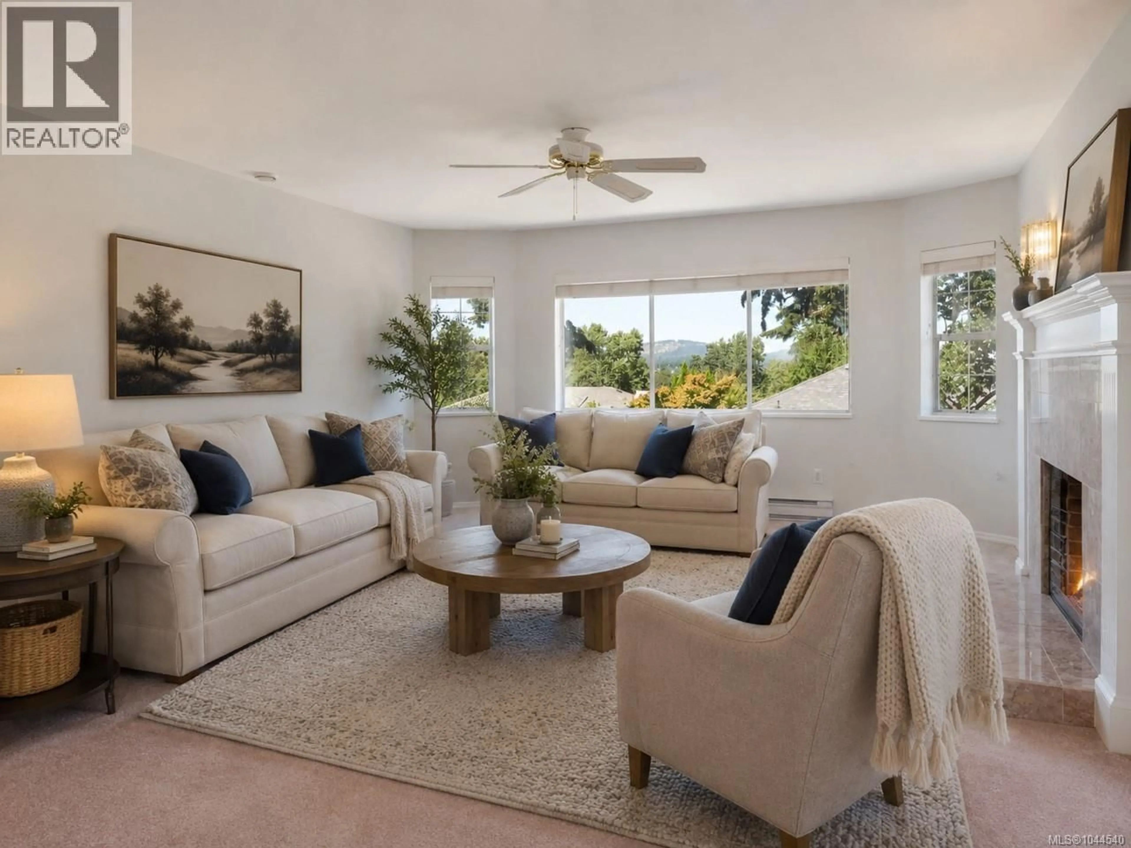 Living room with furniture, carpet floor for 1287 CARMICHAEL COURT, Saanich British Columbia V8Z7B9