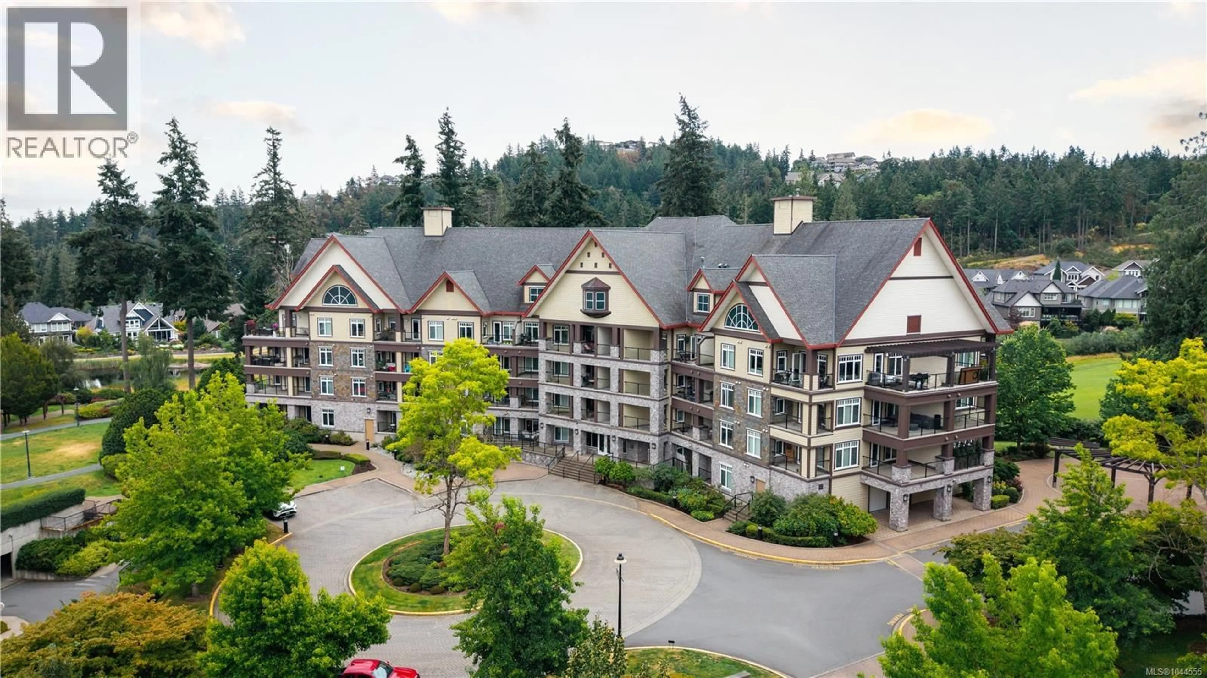 A pic from outside/outdoor area/front of a property/back of a property/a pic from drone, mountain view for 203 - 1375 BEAR MOUNTAIN PARKWAY, Langford British Columbia V9B0C9