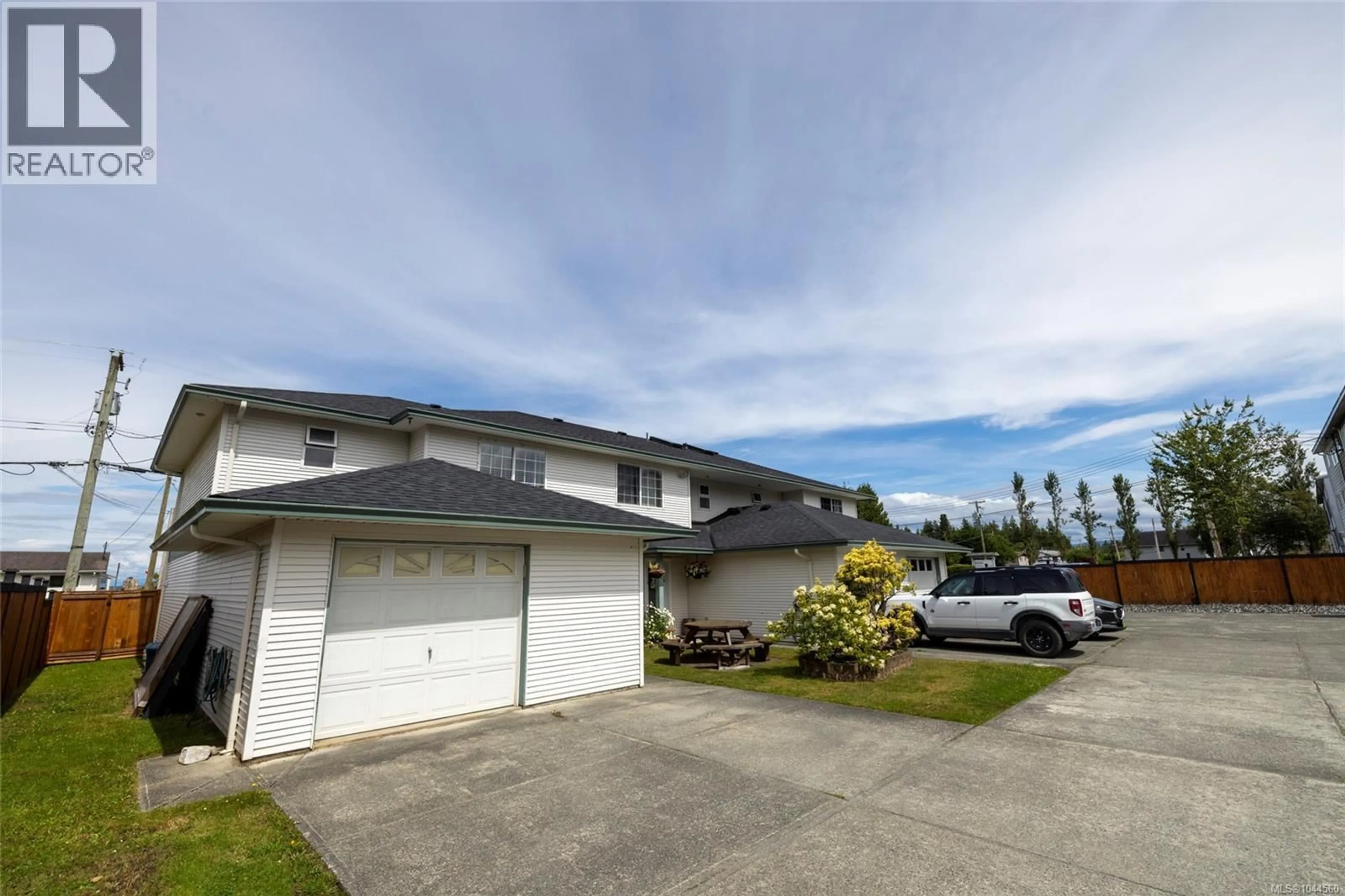 A pic from outside/outdoor area/front of a property/back of a property/a pic from drone, street for 1 - 2553 KINGCOME PLACE, Port McNeill British Columbia V0N2R0
