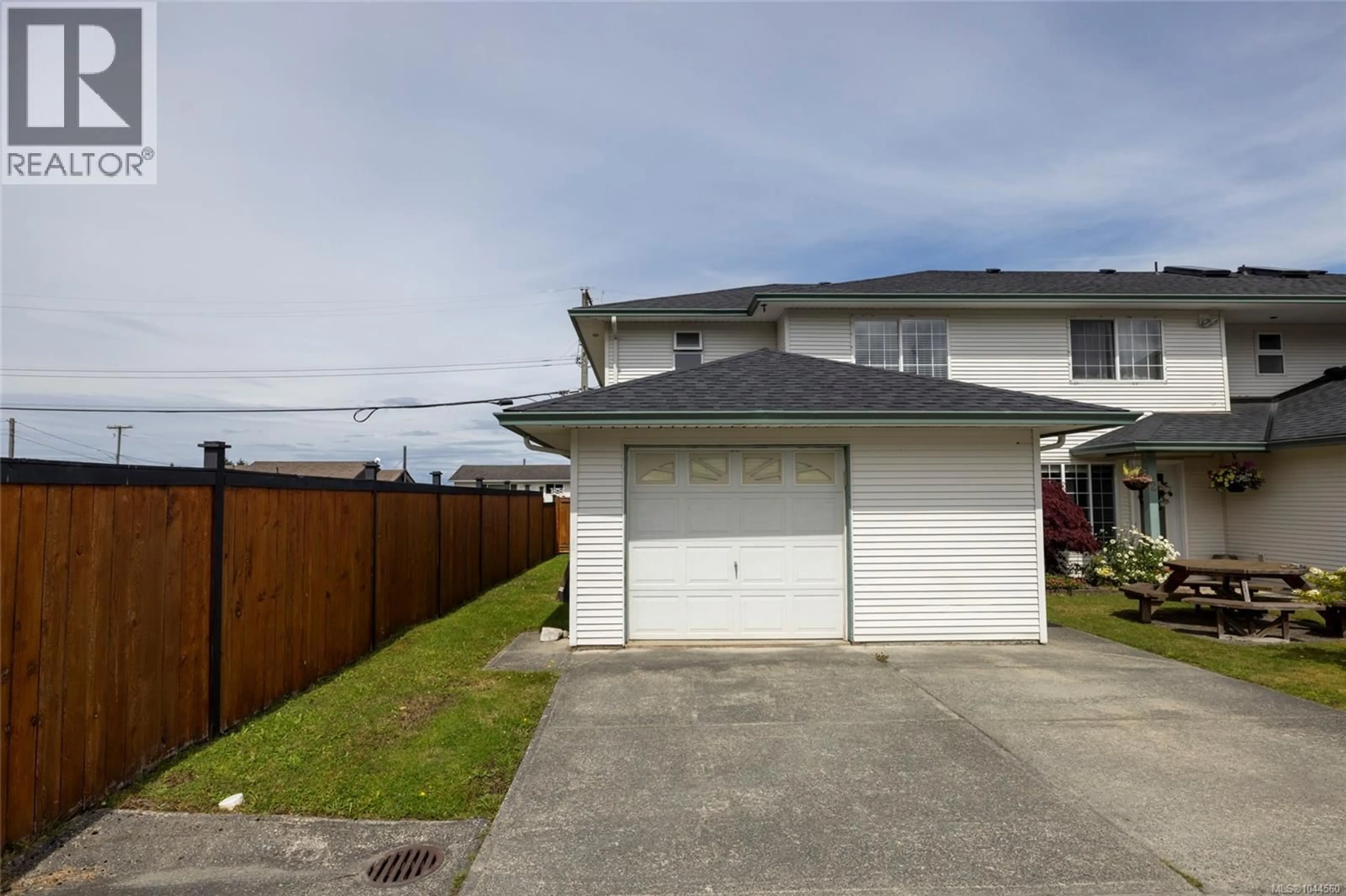 A pic from outside/outdoor area/front of a property/back of a property/a pic from drone, street for 1 - 2553 KINGCOME PLACE, Port McNeill British Columbia V0N2R0