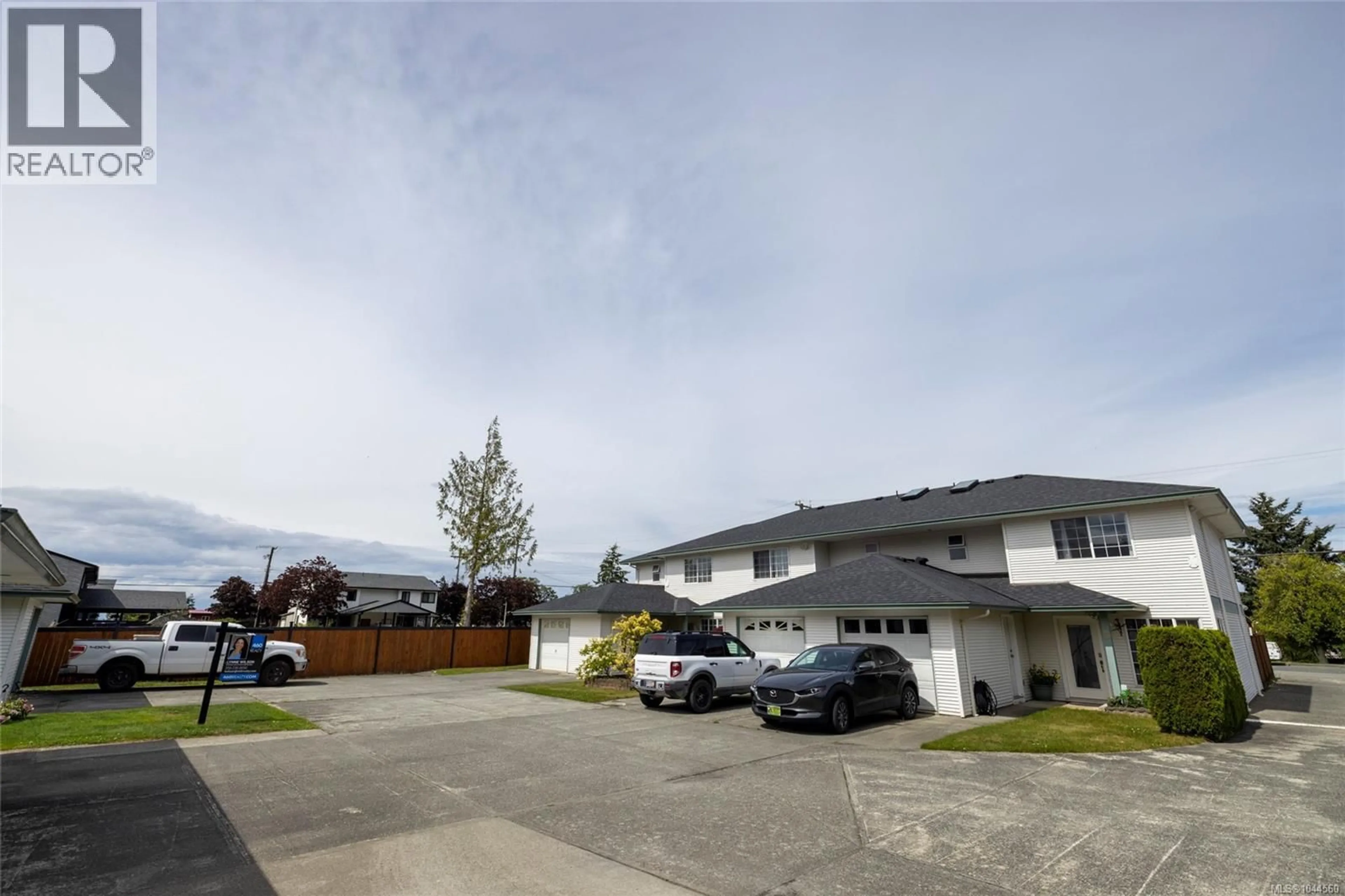 A pic from outside/outdoor area/front of a property/back of a property/a pic from drone, street for 1 - 2553 KINGCOME PLACE, Port McNeill British Columbia V0N2R0