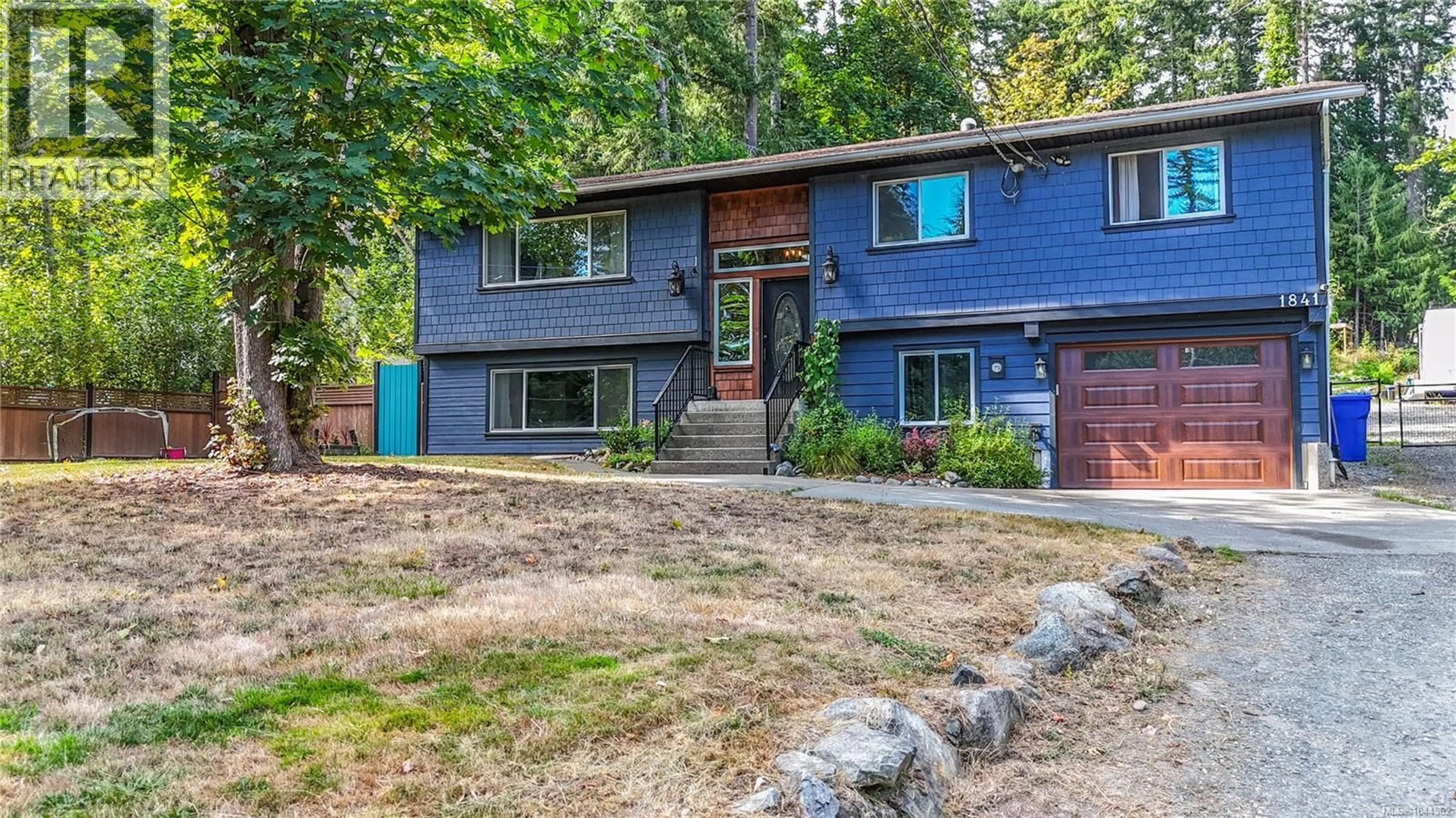 Home with vinyl exterior material, street for 1841 RADWAY ROAD, Shawnigan Lake British Columbia V0R2W2