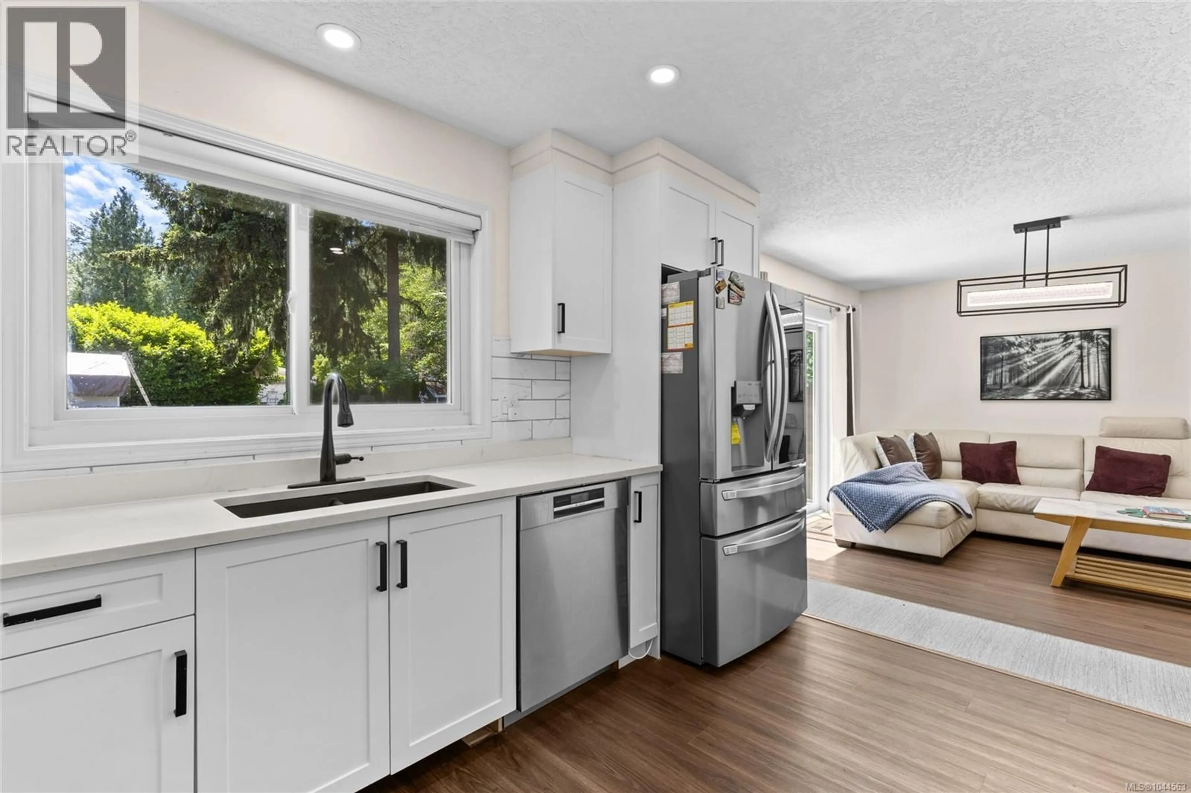 Open concept kitchen, ceramic/tile floor for 1039 HASLAM AVENUE, Langford British Columbia V9B2N3