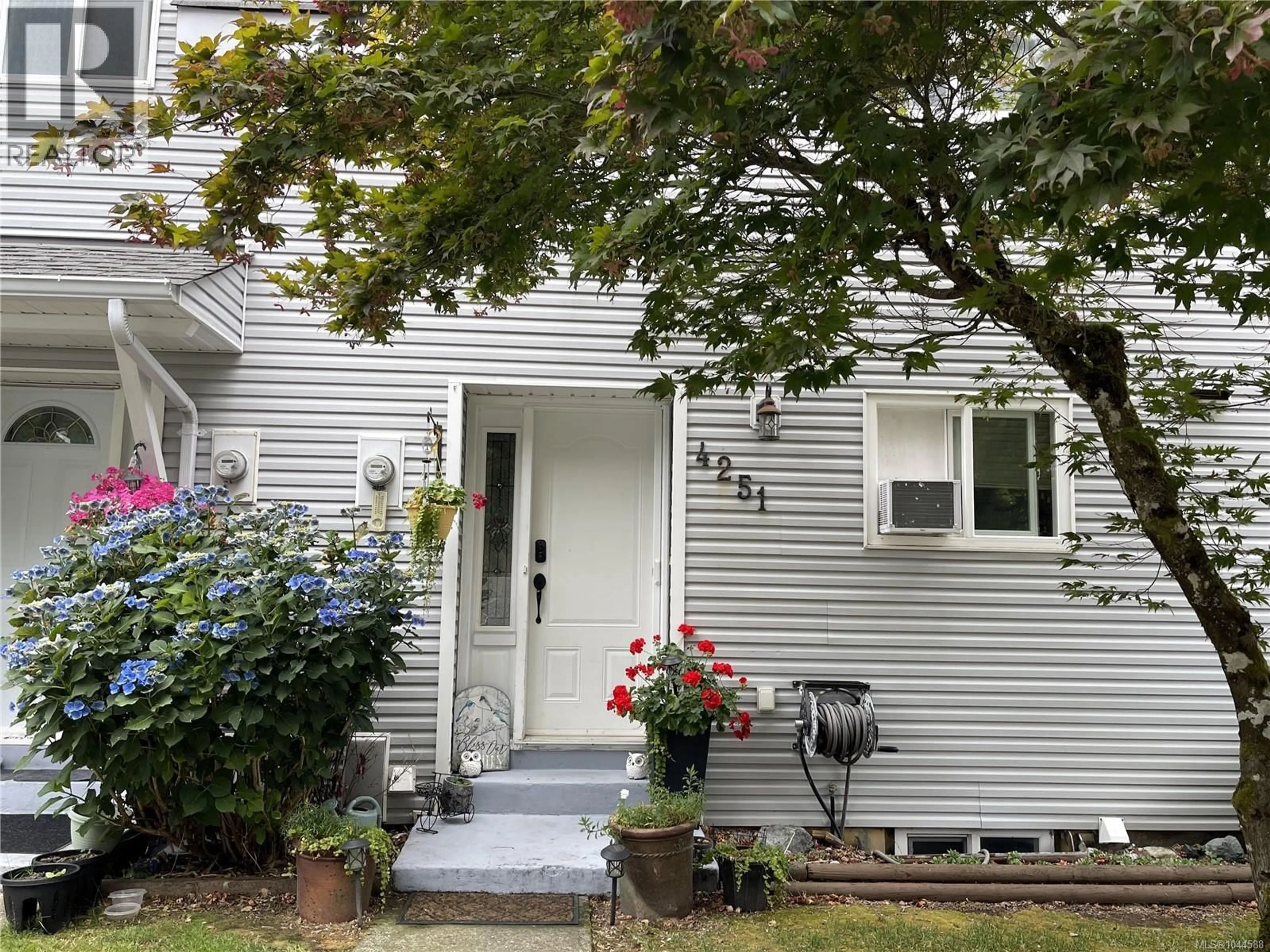 Home with vinyl exterior material, street for 4251 8TH AVENUE, Port Alberni British Columbia V9Y4S5