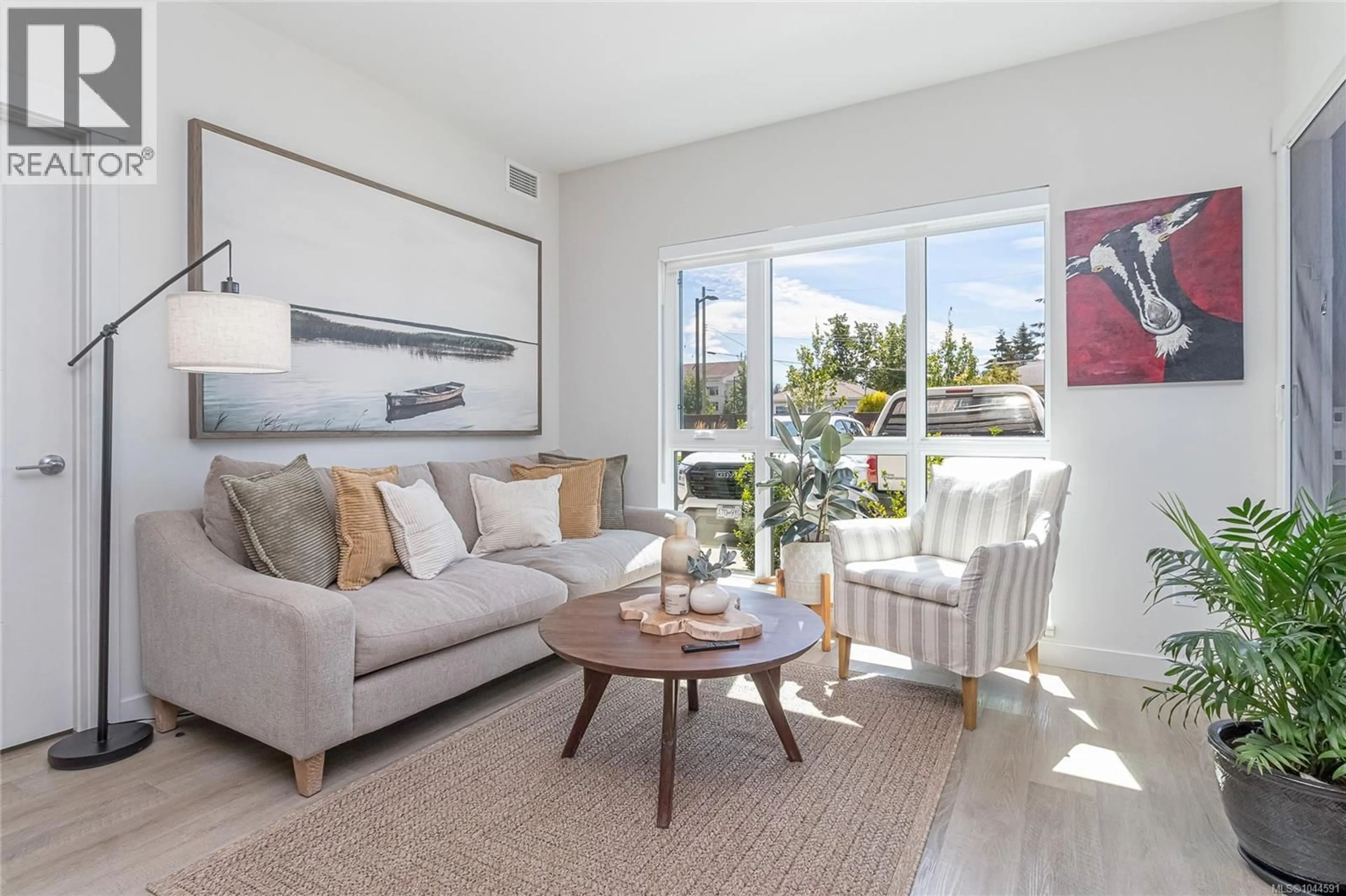 Living room with furniture, unknown for 106 - 120 JENSEN AVENUE WEST, Parksville British Columbia V9P0H6