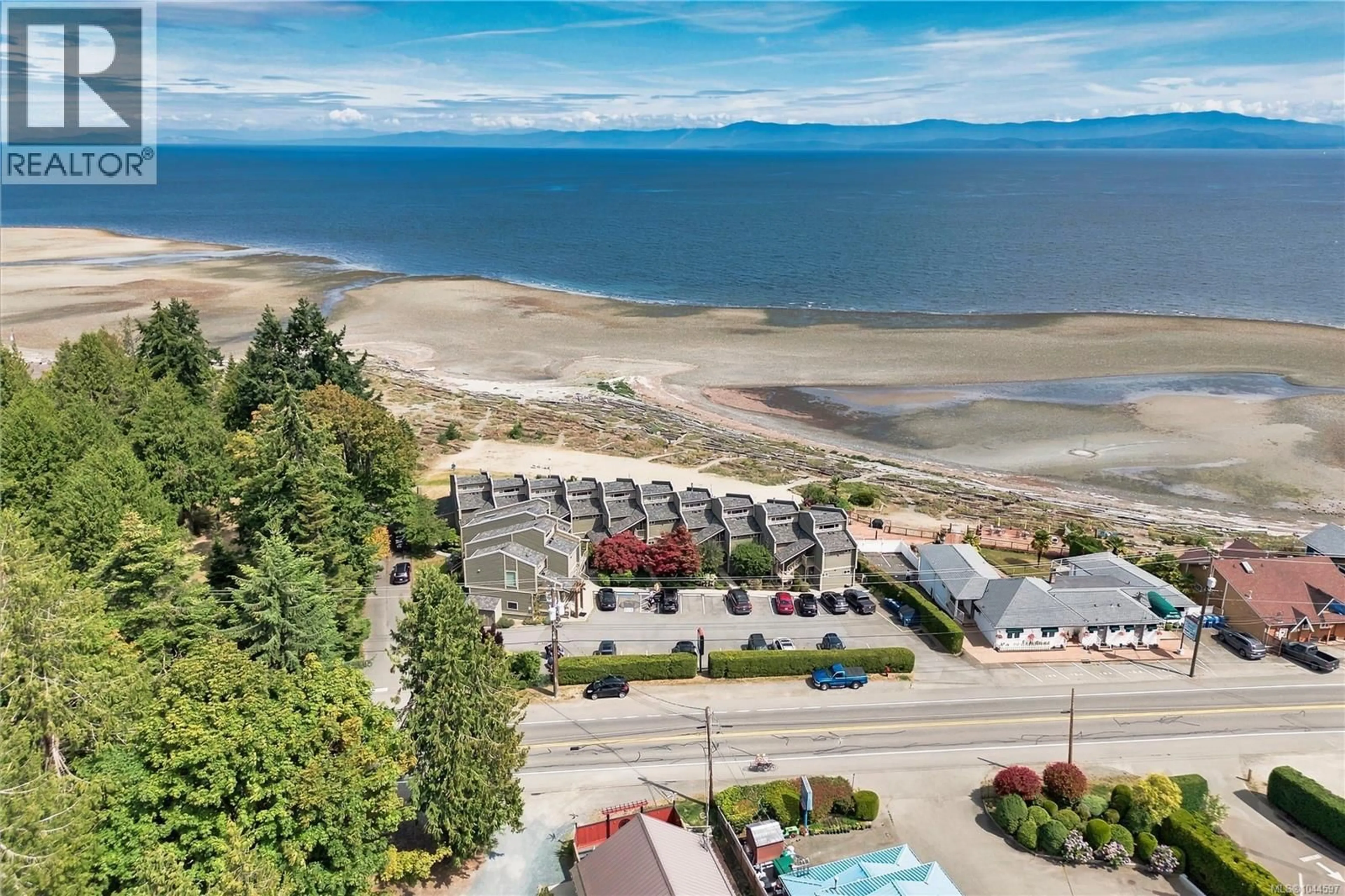 A pic from outside/outdoor area/front of a property/back of a property/a pic from drone, water/lake/river/ocean view for 202 - 3295 ISLAND HIGHWAY WEST, Qualicum Beach British Columbia V9K2C6