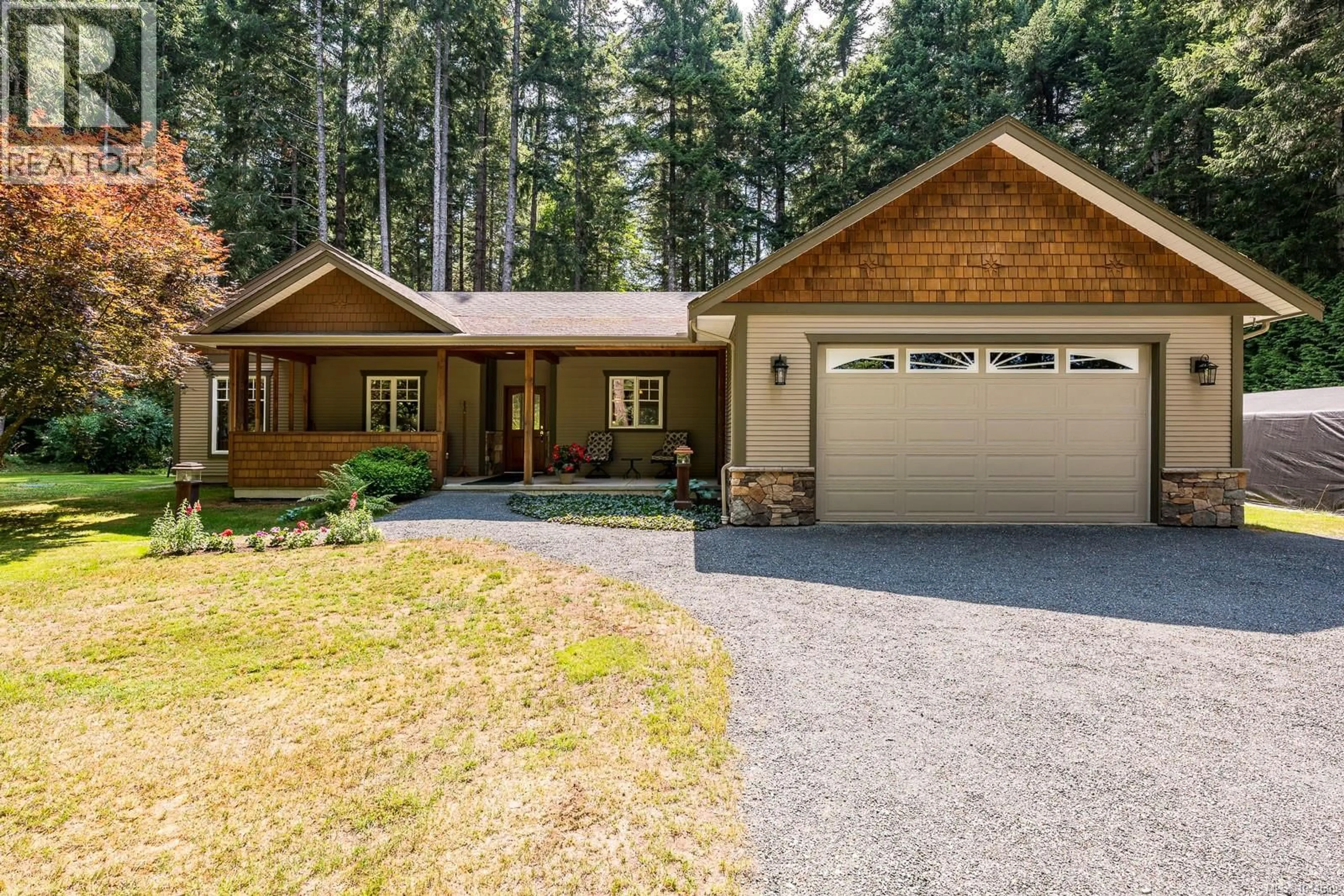 Home with vinyl exterior material, street for 307 BATES DRIVE, Fanny Bay British Columbia V0R1W0