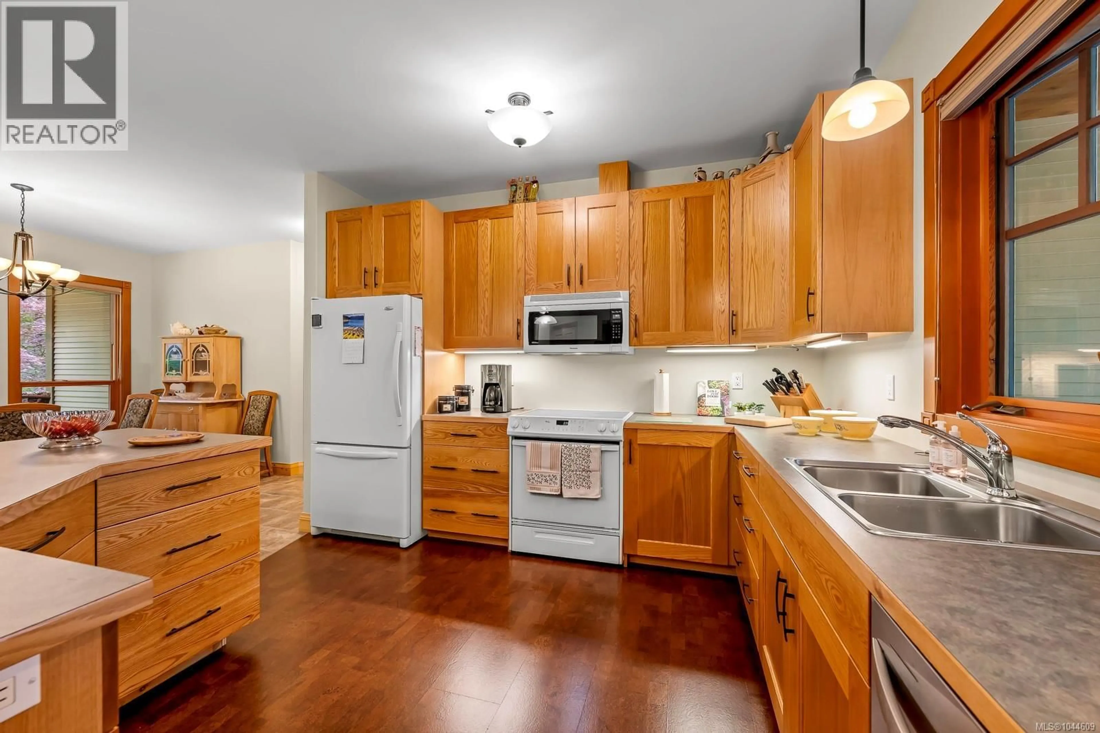 Standard kitchen, wood/laminate floor for 307 BATES DRIVE, Fanny Bay British Columbia V0R1W0