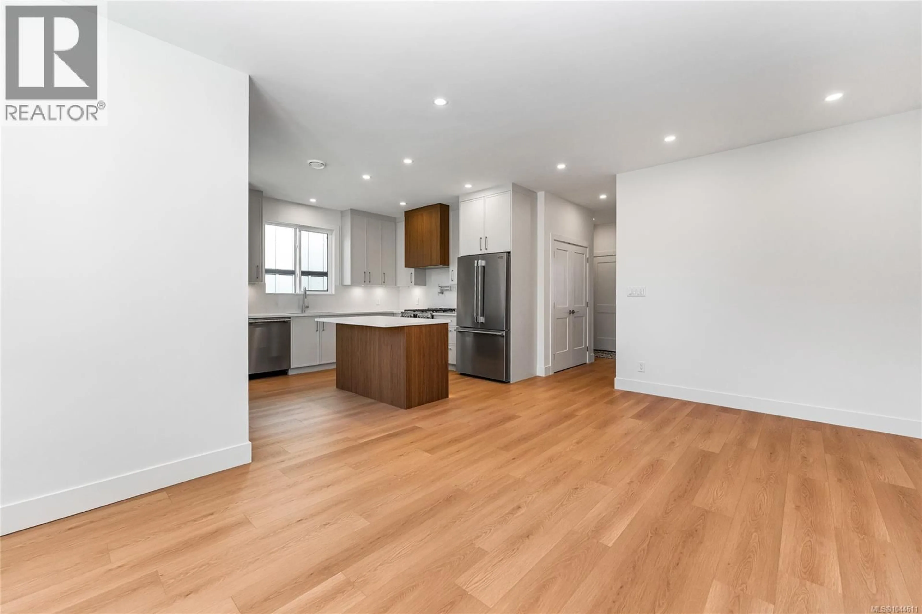 Open concept kitchen, wood/laminate floor for 3849 OLYMPIAN WAY, Colwood British Columbia V9C0R7