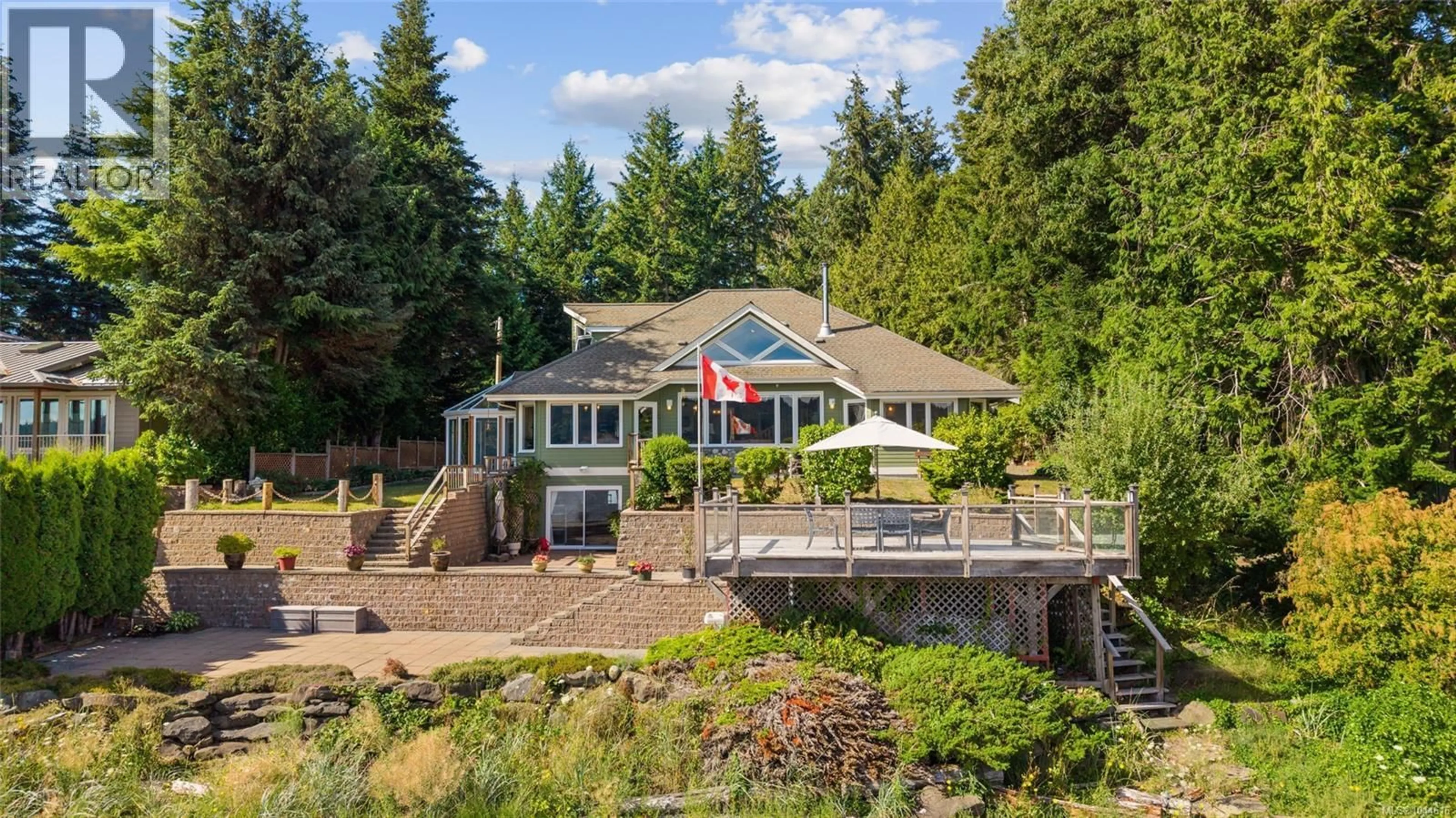 A pic from outside/outdoor area/front of a property/back of a property/a pic from drone, water/lake/river/ocean view for 7602 SHIPS POINT ROAD, Fanny Bay British Columbia V0R1W0