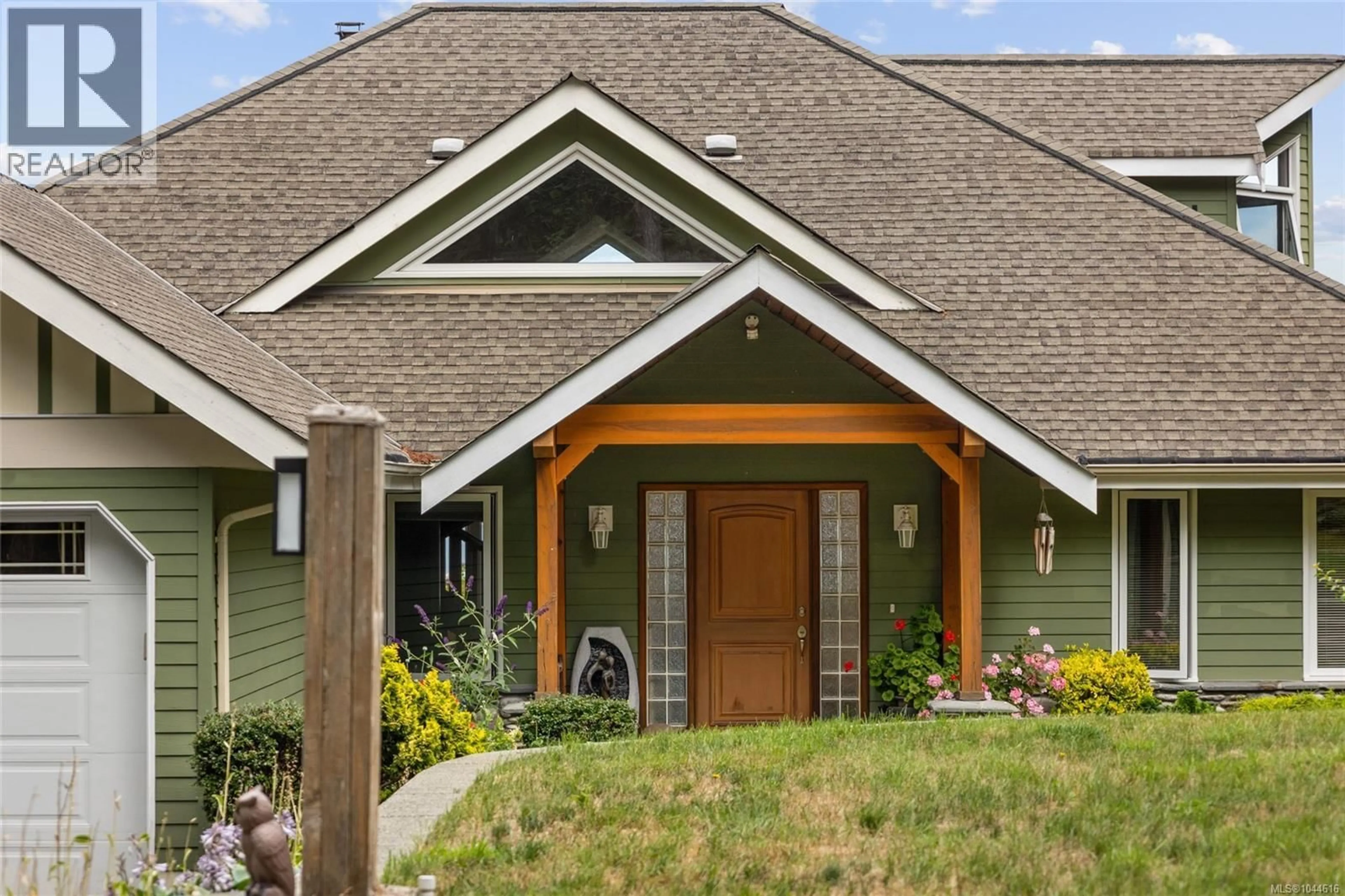 Home with vinyl exterior material, street for 7602 SHIPS POINT ROAD, Fanny Bay British Columbia V0R1W0