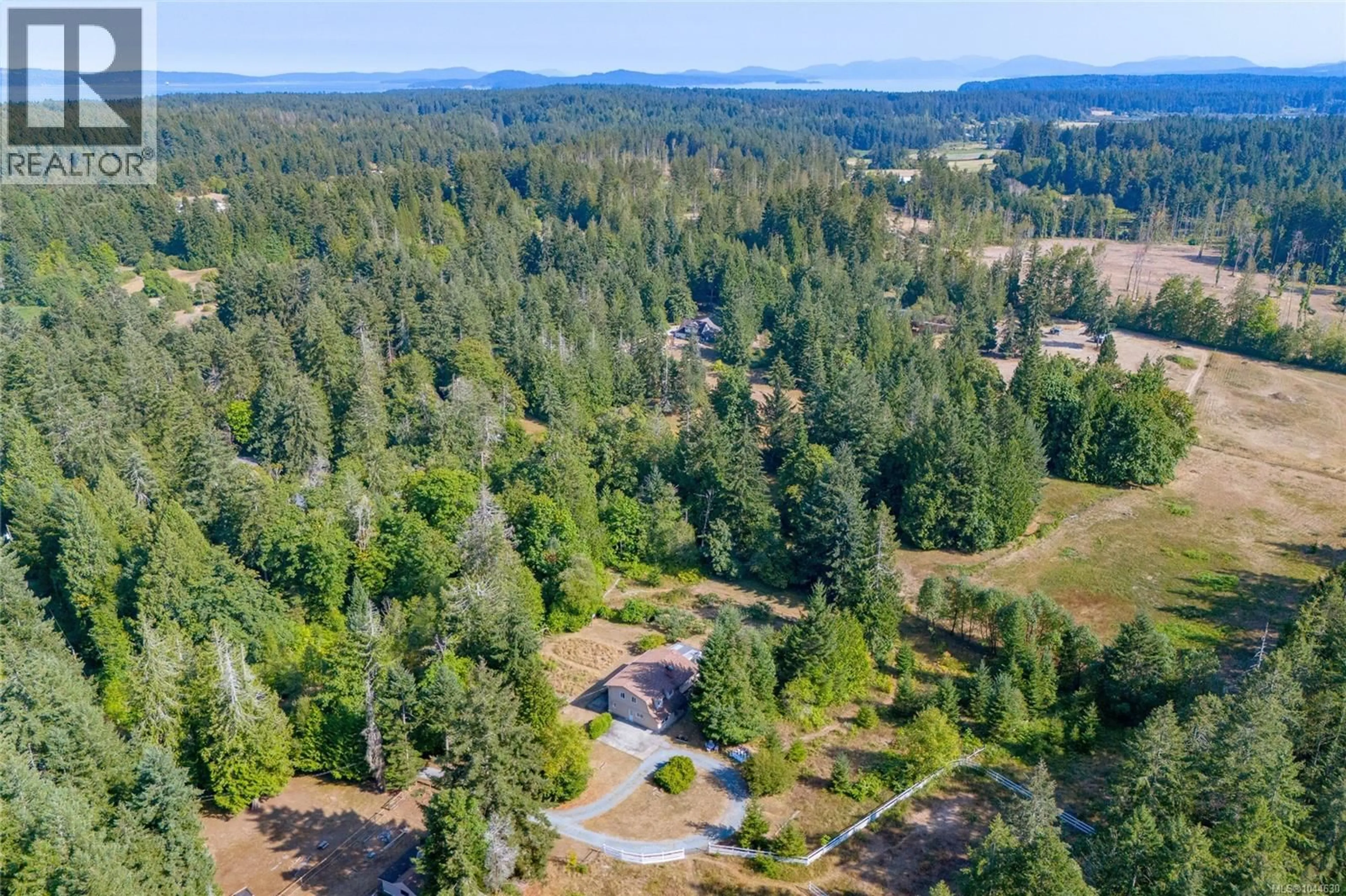 A pic from outside/outdoor area/front of a property/back of a property/a pic from drone, forest/trees view for 2789 VANAPPELEN ROAD, Nanaimo British Columbia V9X1K5