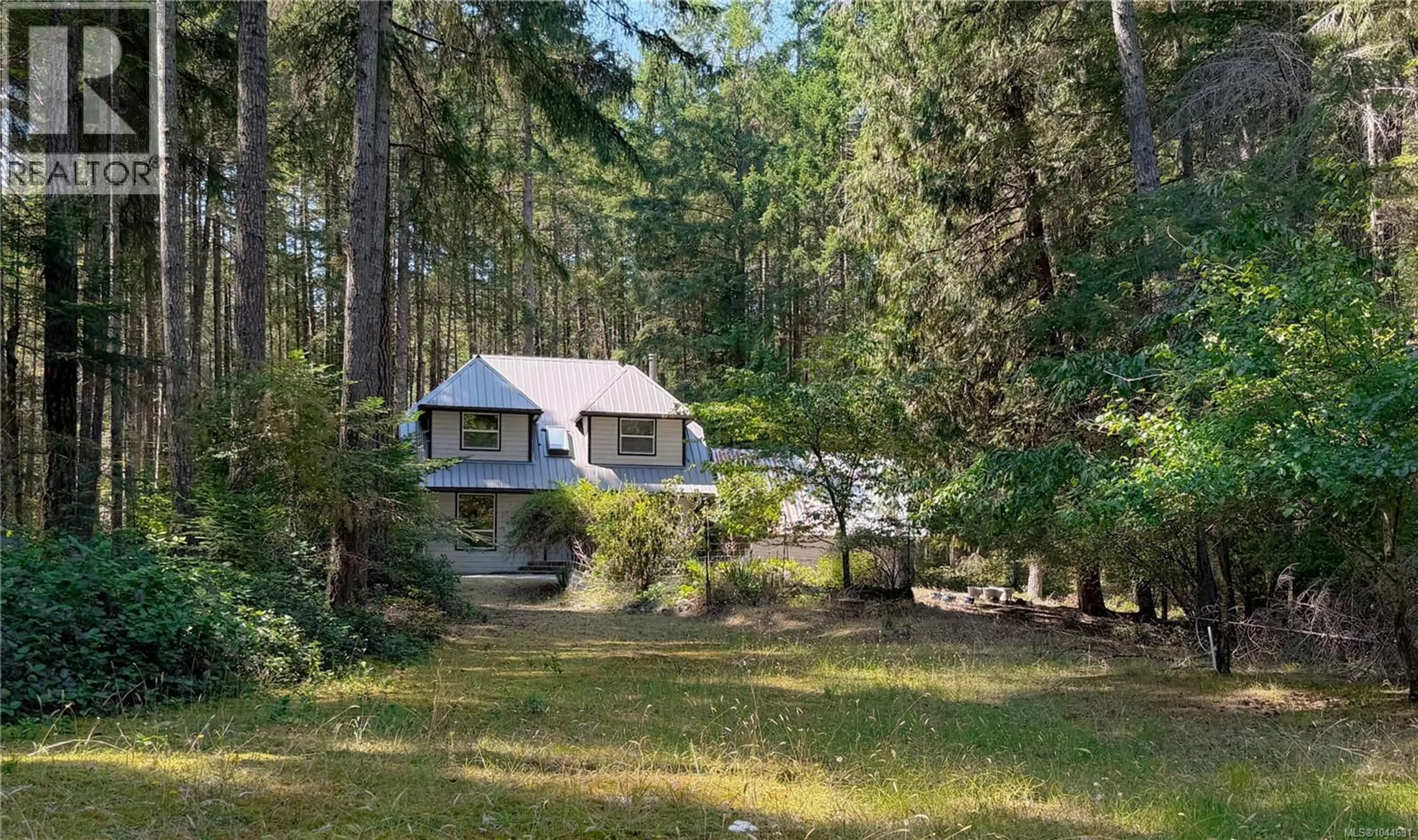 A pic from outside/outdoor area/front of a property/back of a property/a pic from drone, forest/trees view for 980 COATS DRIVE, Gabriola Island British Columbia V0R1X3