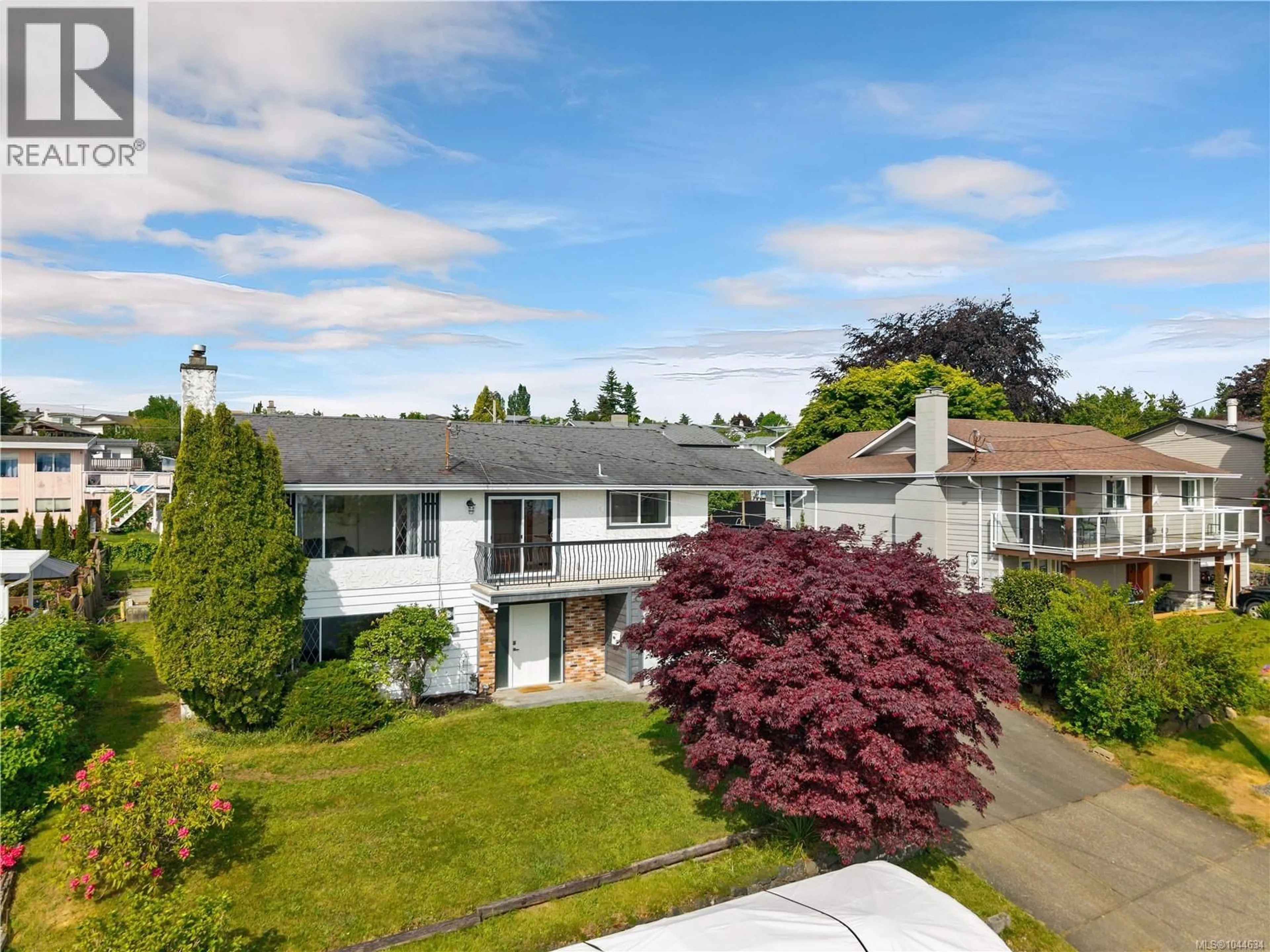 A pic from outside/outdoor area/front of a property/back of a property/a pic from drone, street for 880 GALERNO ROAD, Campbell River British Columbia V9W5J4
