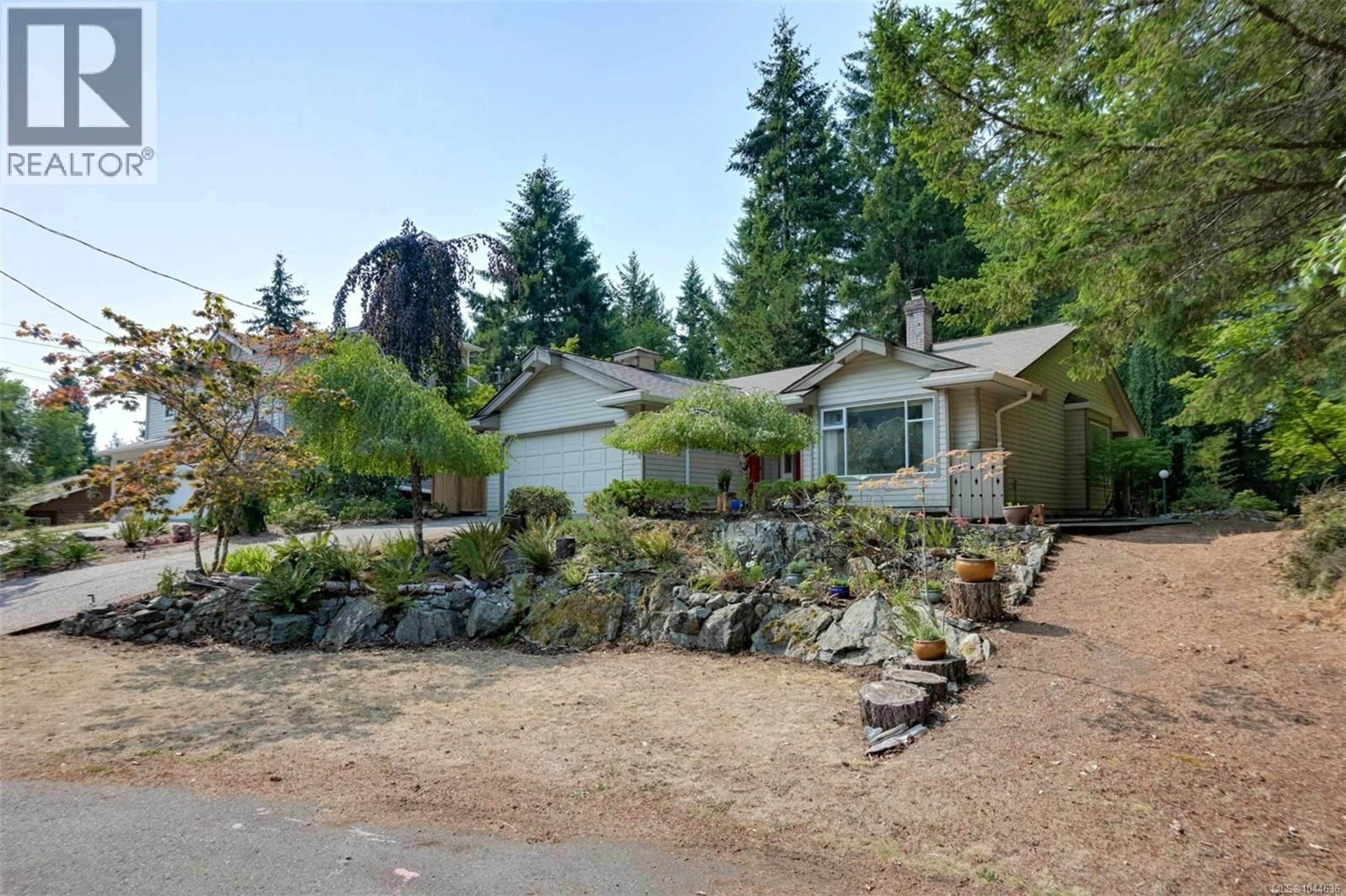 A pic from outside/outdoor area/front of a property/back of a property/a pic from drone, unknown for 2370 LARSEN ROAD, Shawnigan Lake British Columbia V8H2E7
