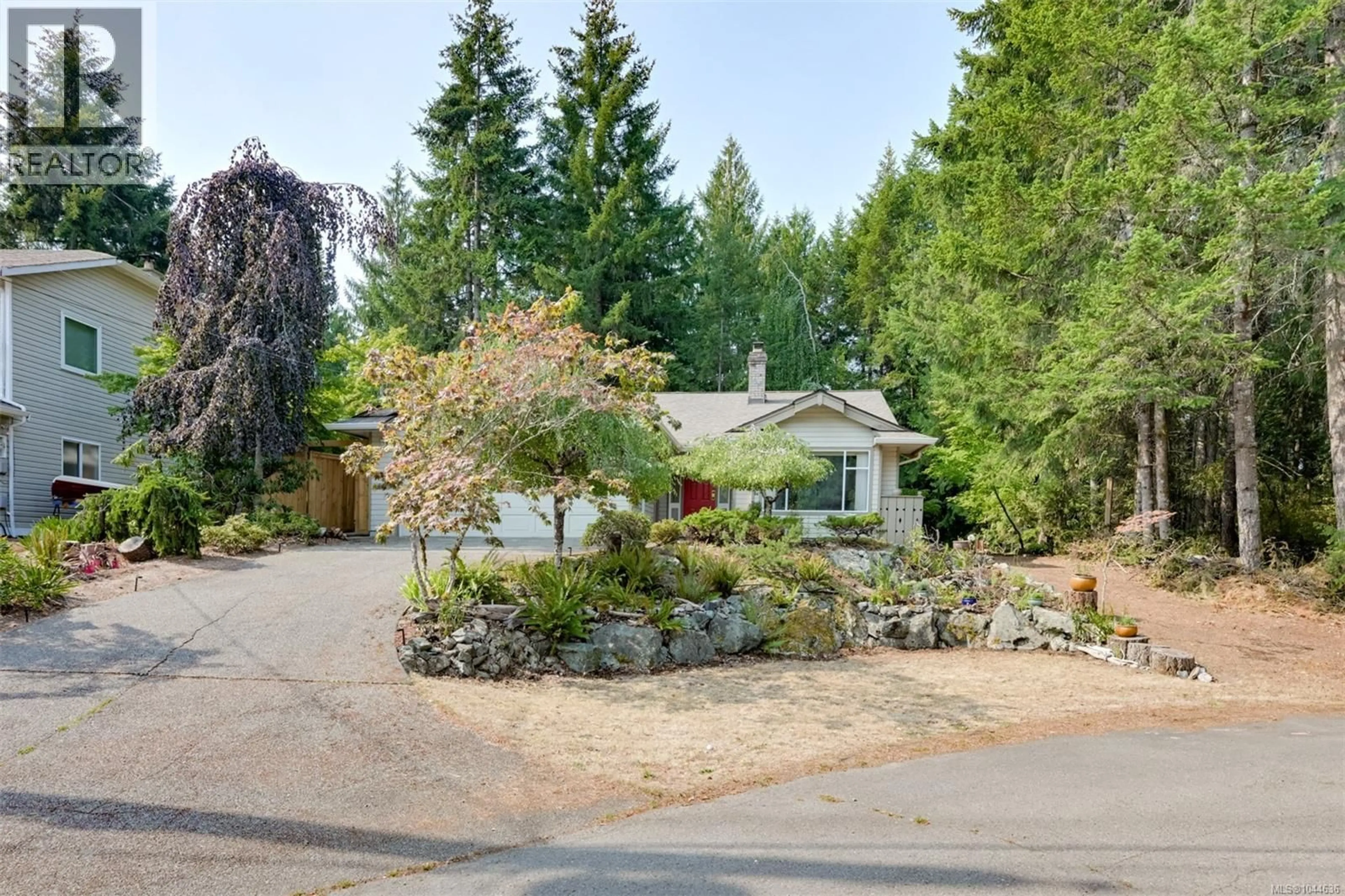 A pic from outside/outdoor area/front of a property/back of a property/a pic from drone, street for 2370 LARSEN ROAD, Shawnigan Lake British Columbia V8H2E7