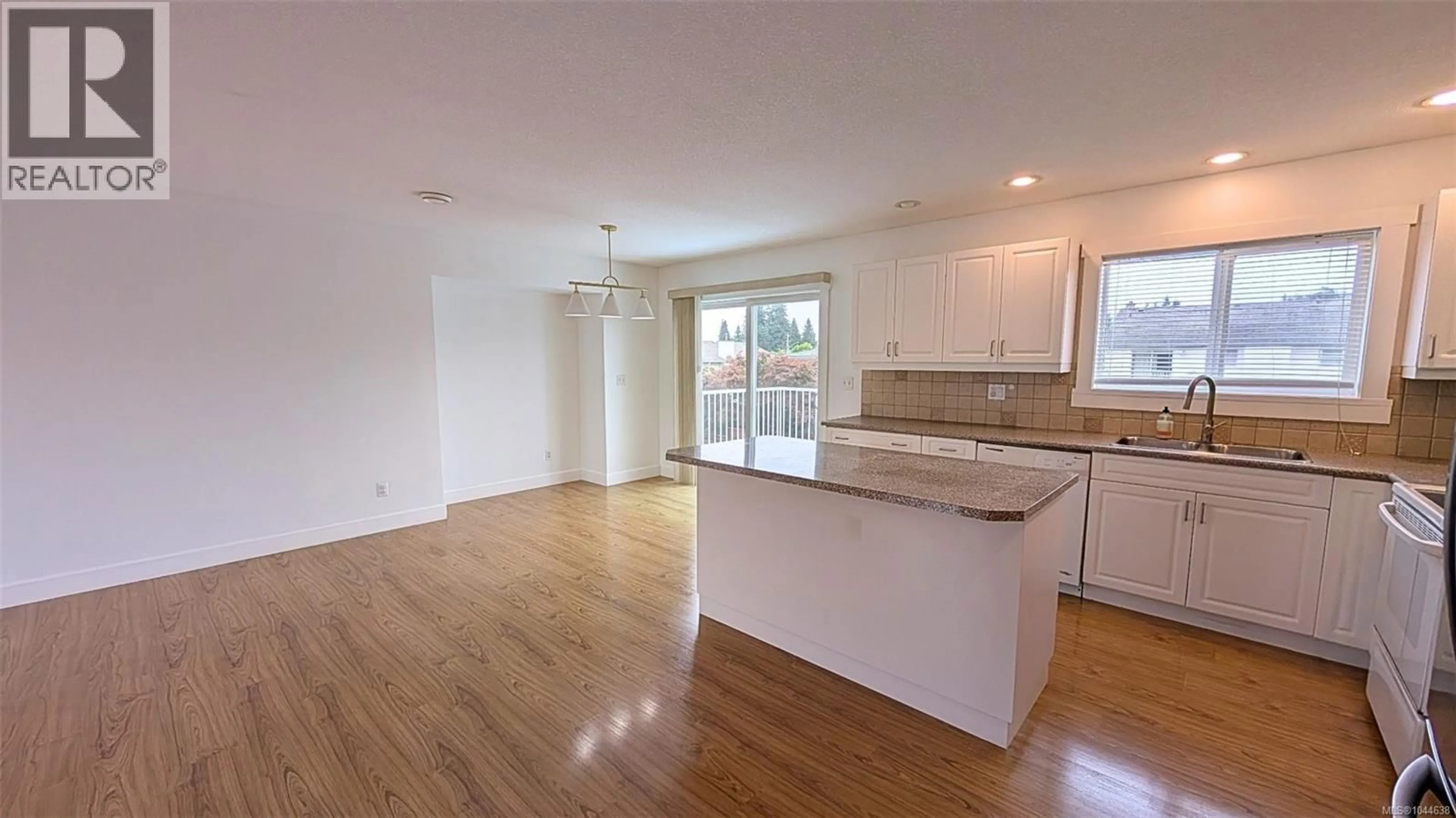 Open concept kitchen, wood/laminate floor for 1721 NORTHFIELD ROAD, Nanaimo British Columbia V9S3B1
