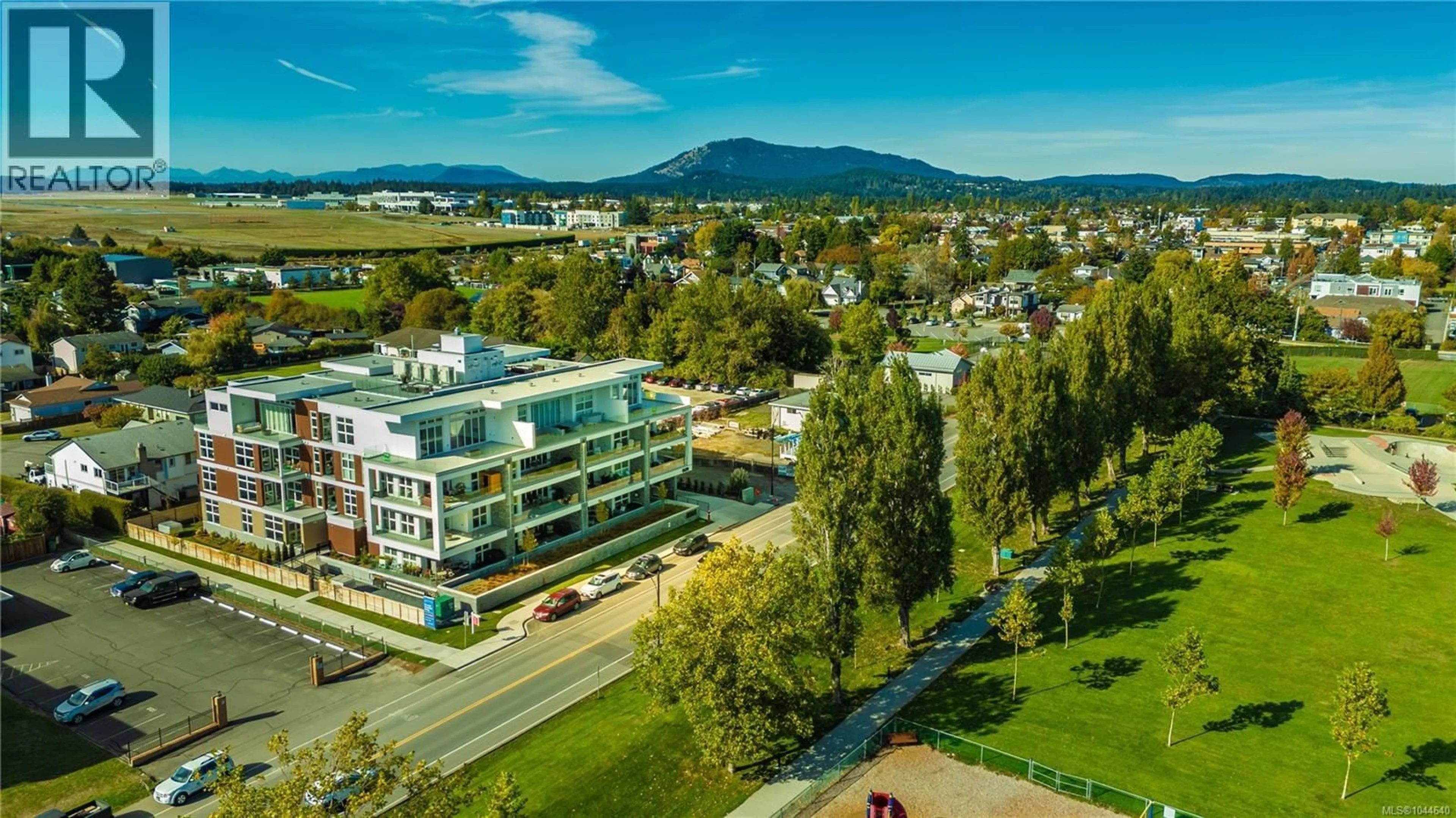 A pic from outside/outdoor area/front of a property/back of a property/a pic from drone, mountain view for 107 - 9570 FIFTH STREET, Sidney British Columbia V8L2W5