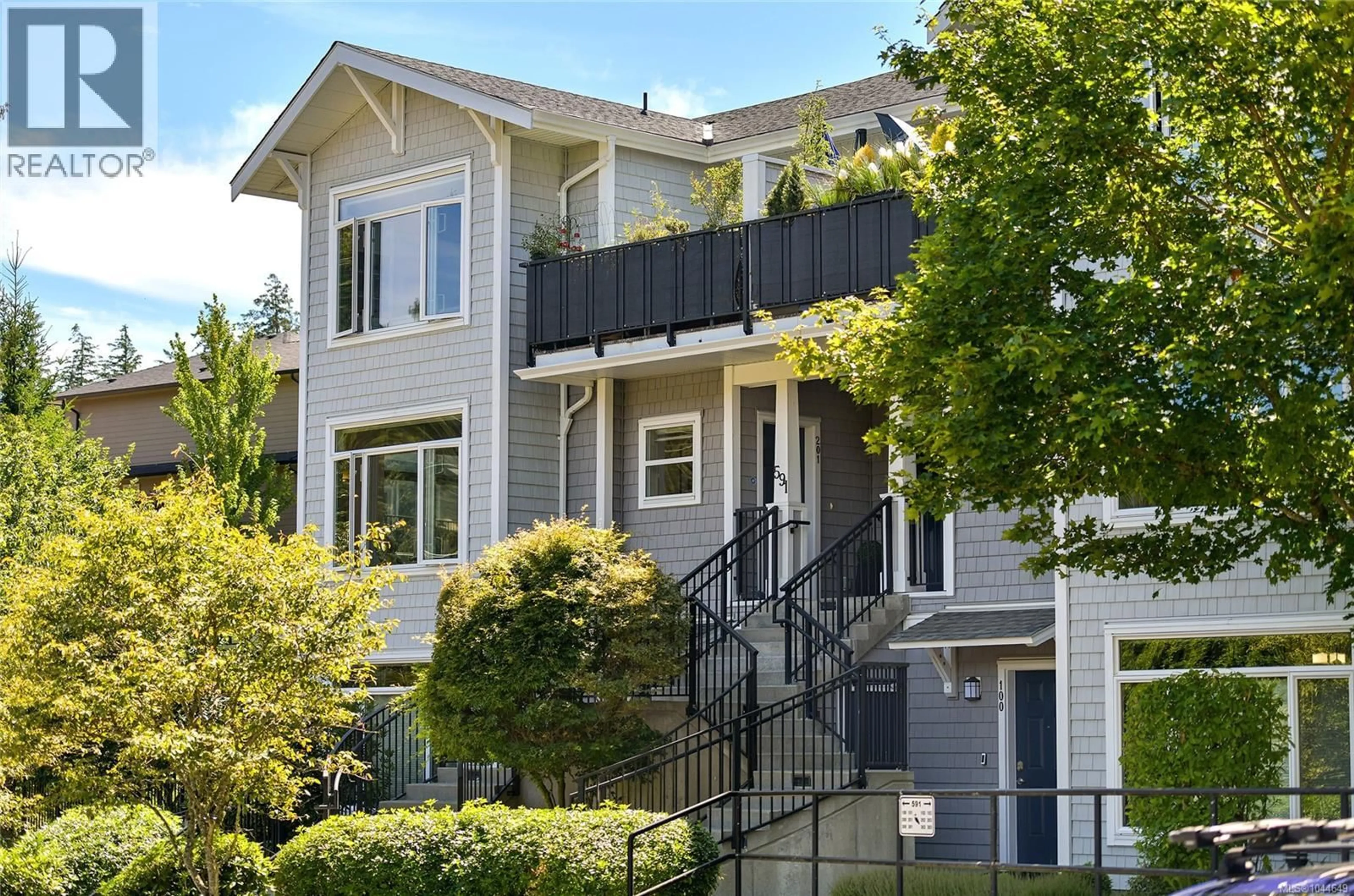 Home with vinyl exterior material, street for 201 - 591 LATORIA ROAD, Langford British Columbia V8W2T6
