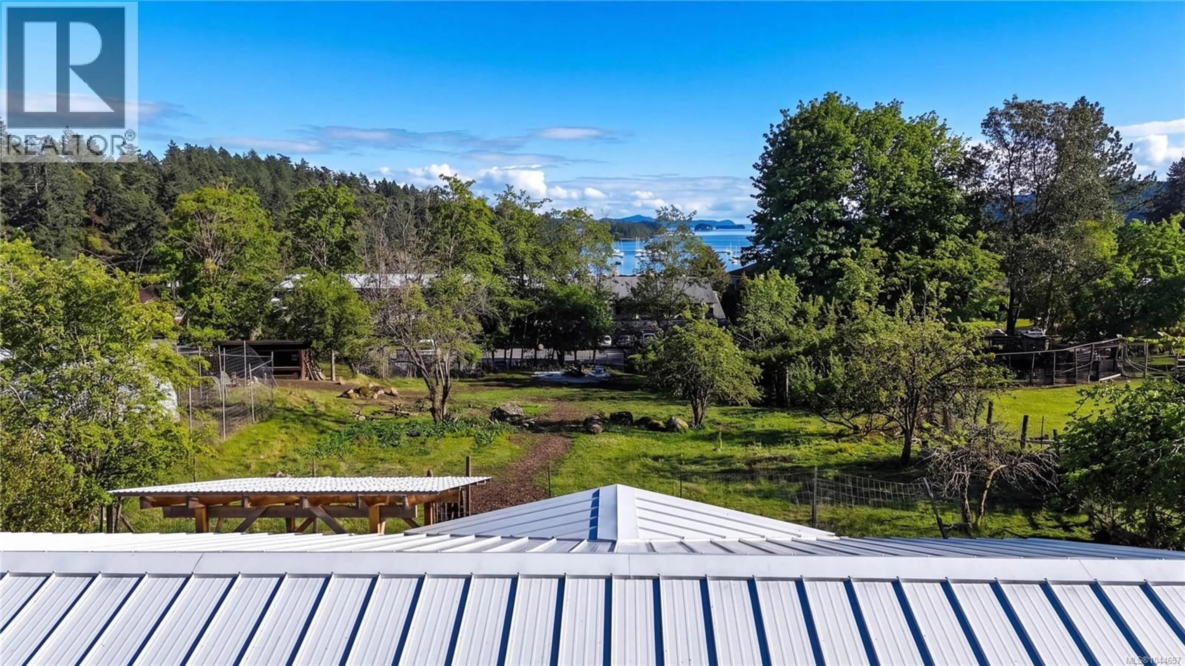 A pic from outside/outdoor area/front of a property/back of a property/a pic from drone, water/lake/river/ocean view for 265 LOWER GANGES ROAD, Salt Spring British Columbia V8K1S7