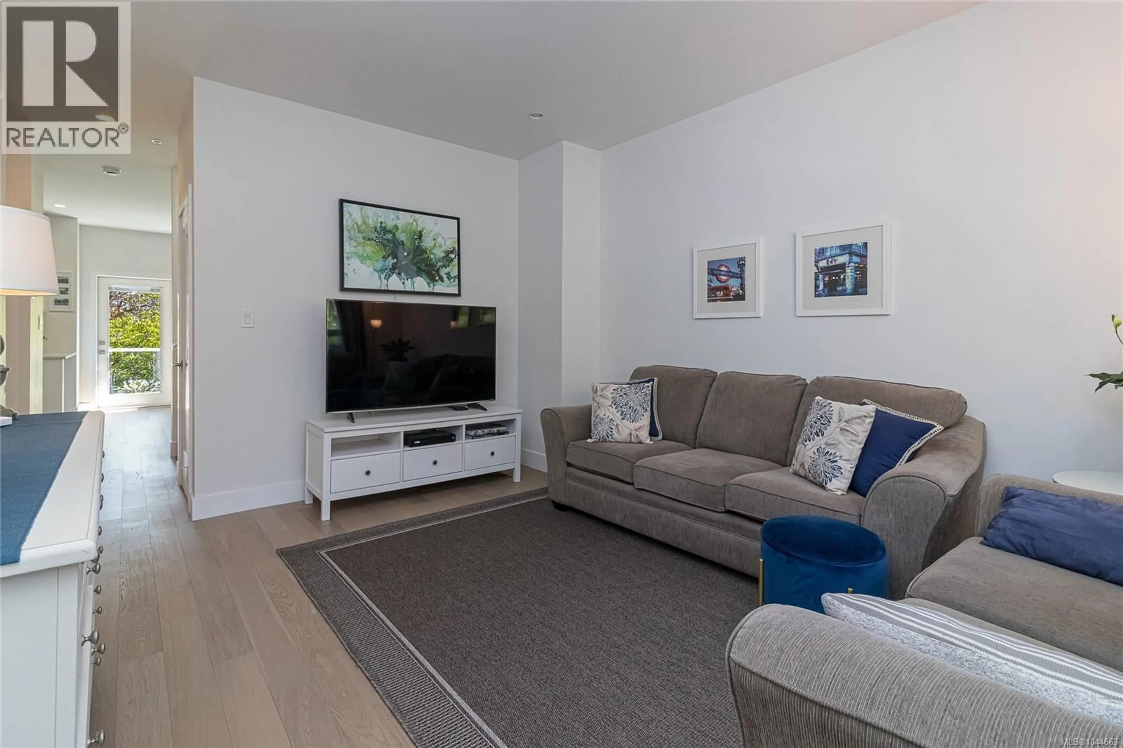 Living room with furniture, wood/laminate floor for 2 - 1649 LLOYD PLACE, View Royal British Columbia V9C0E5