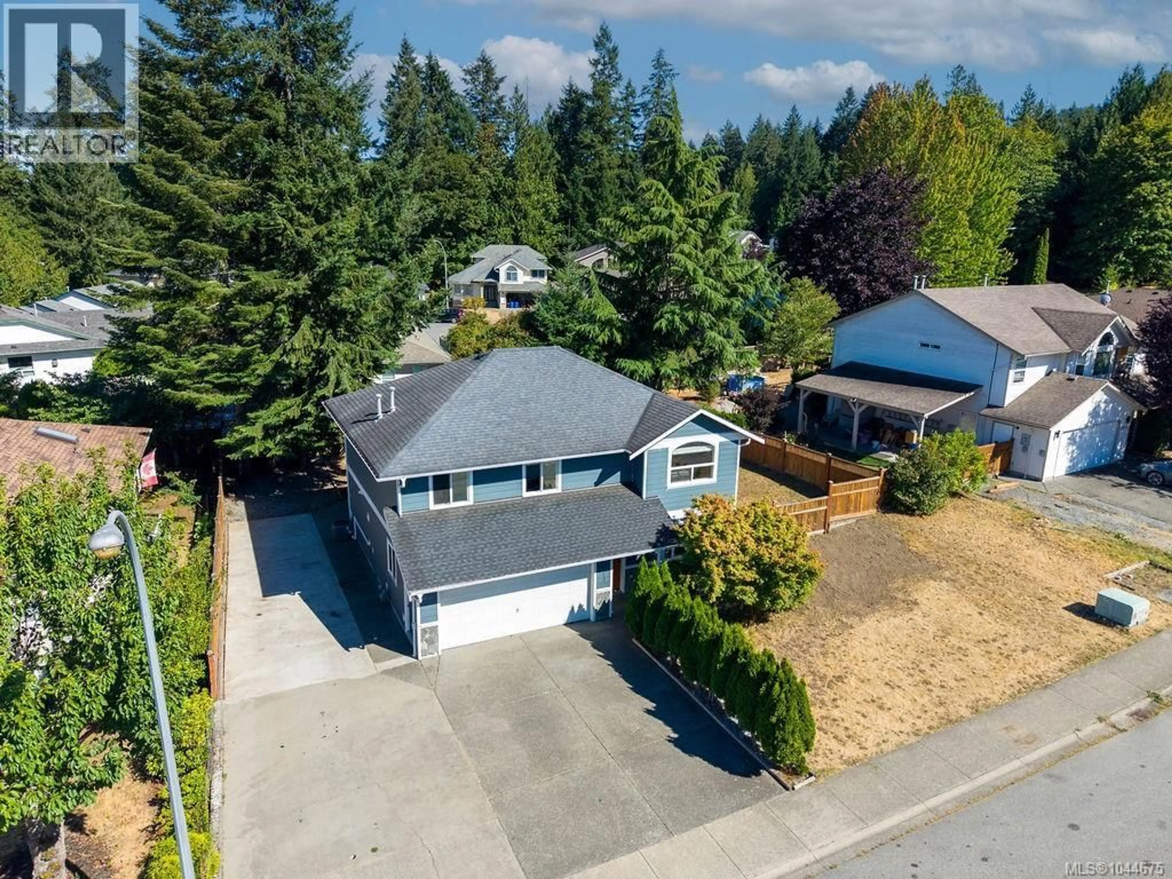 A pic from outside/outdoor area/front of a property/back of a property/a pic from drone, street for 1217 MCKINLEY ROAD, Ladysmith British Columbia V9G1P9