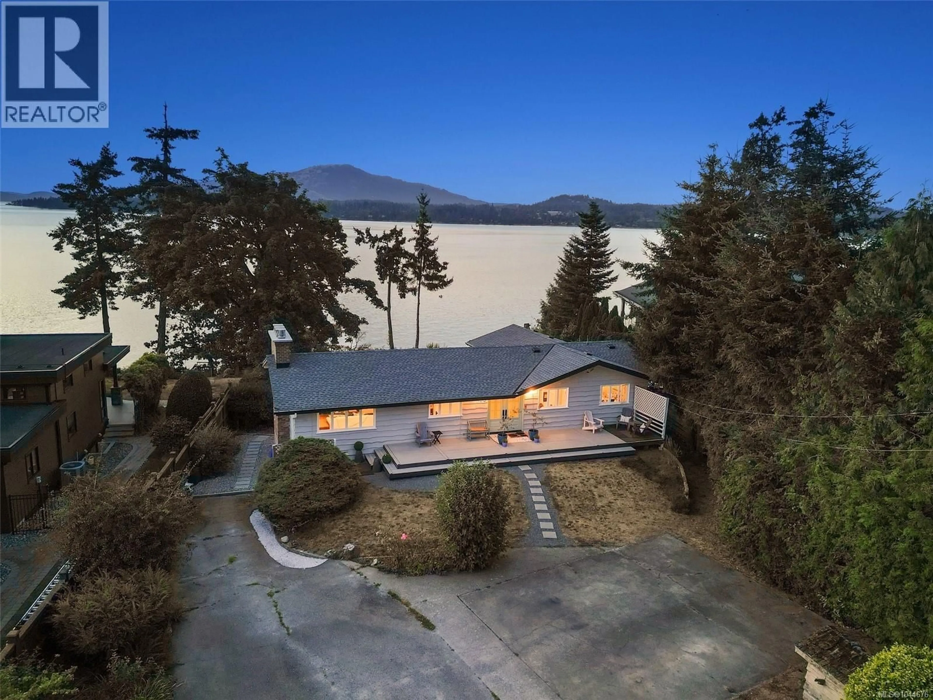 A pic from outside/outdoor area/front of a property/back of a property/a pic from drone, mountain view for 9760 GLYNNWOOD PARK ROAD, North Saanich British Columbia V8L5H4