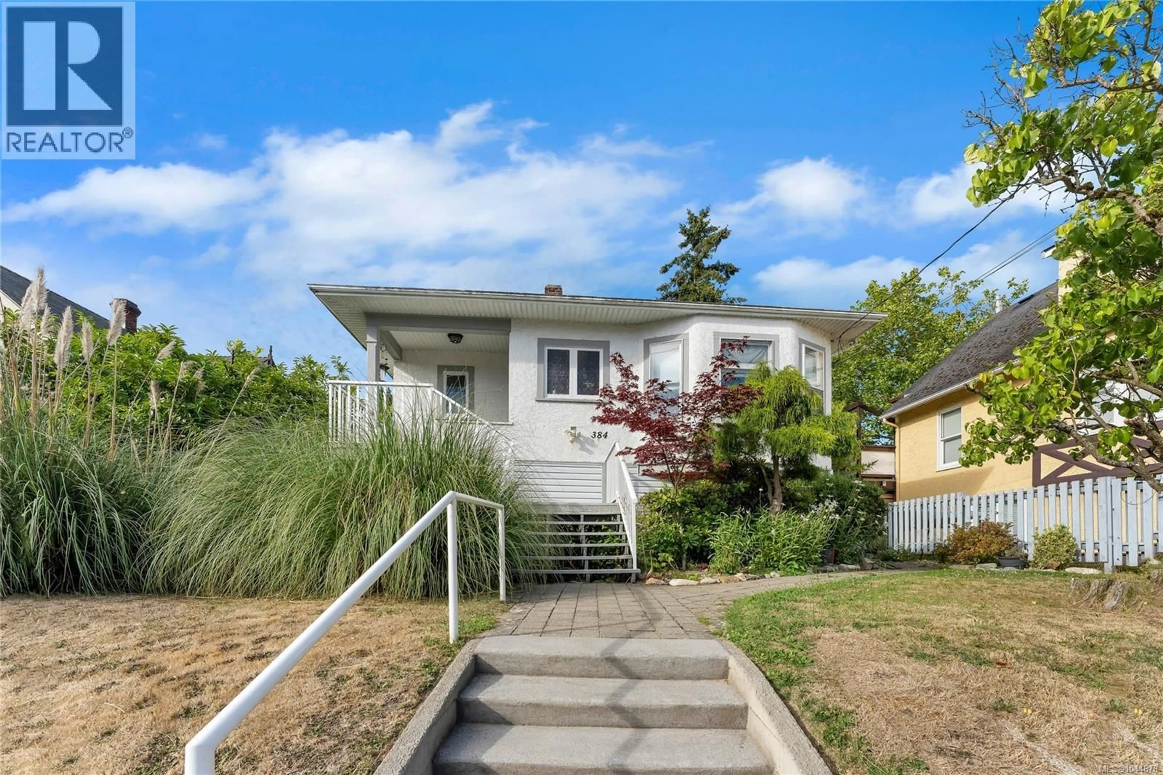 Home with vinyl exterior material, street for 384 BURNSIDE ROAD EAST, Victoria British Columbia V9A1A5