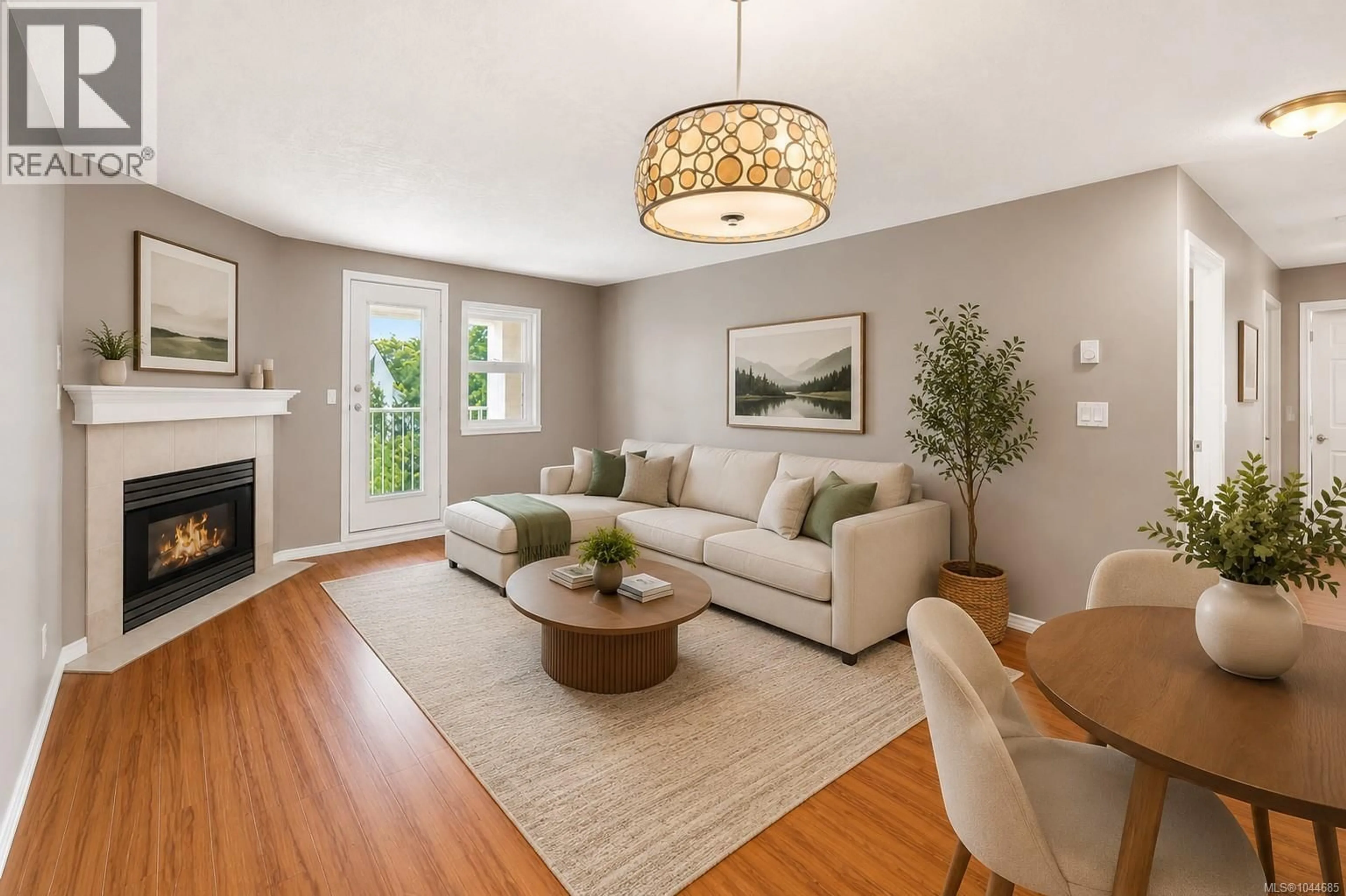 Living room with furniture, wood/laminate floor for 307 - 3010 WASHINGTON AVENUE, Victoria British Columbia V9A1P6