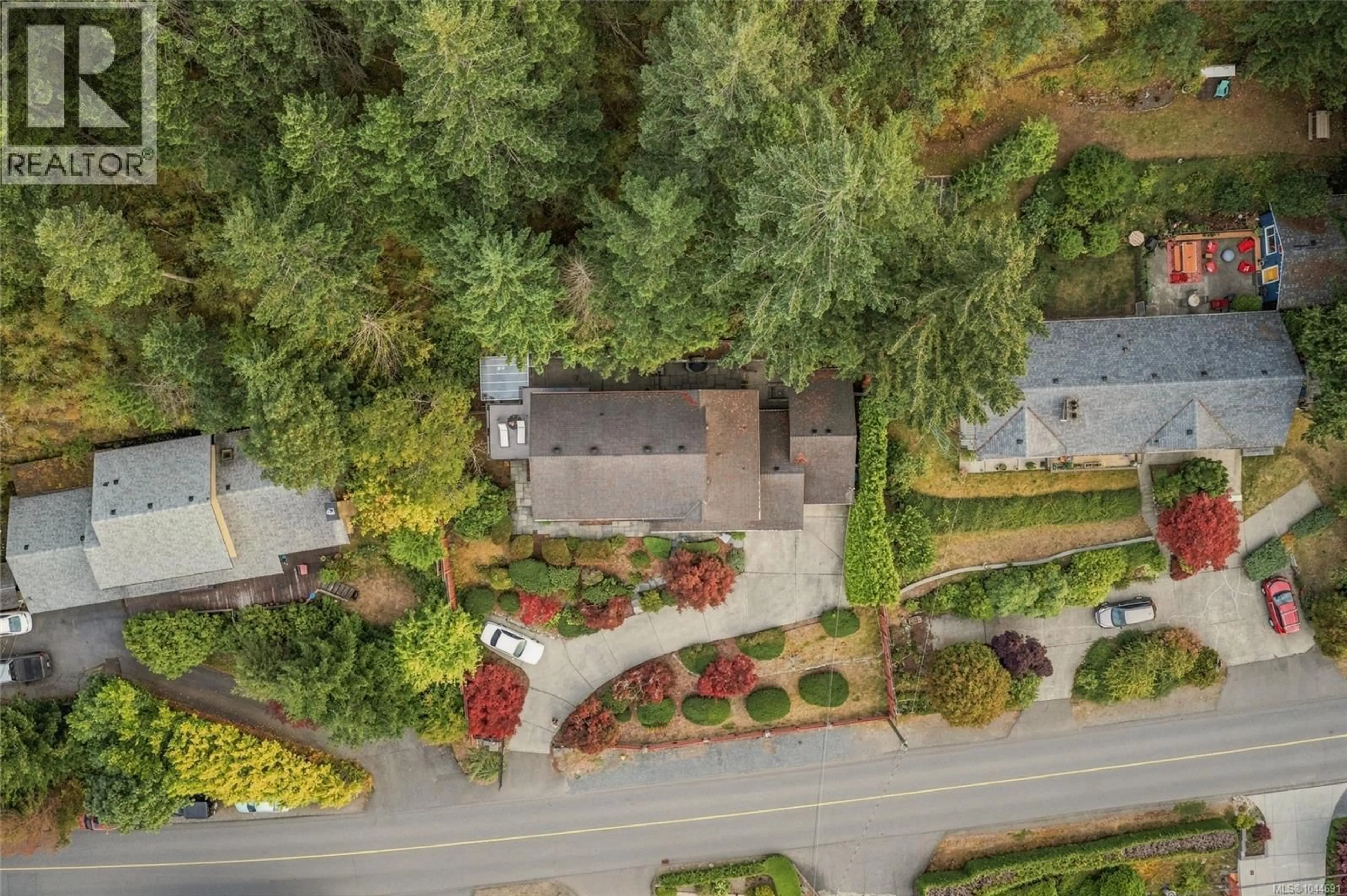A pic from outside/outdoor area/front of a property/back of a property/a pic from drone, street for 5287 LOST LAKE ROAD, Nanaimo British Columbia V9T5E6