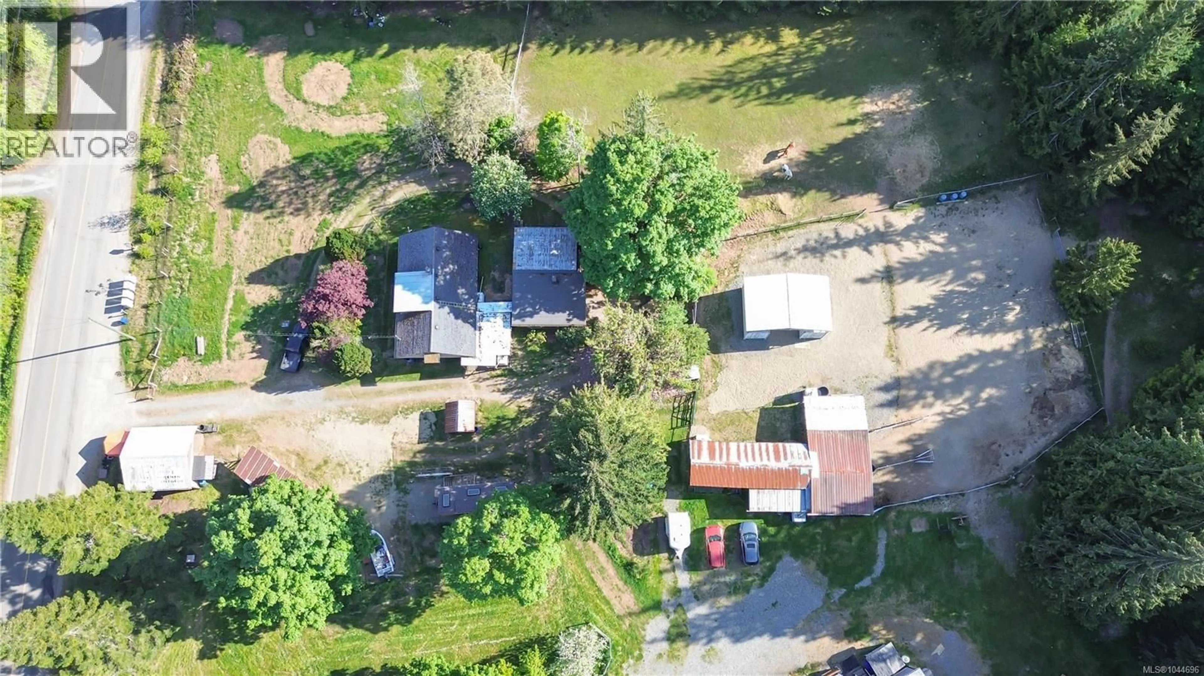 A pic from outside/outdoor area/front of a property/back of a property/a pic from drone, street for 1341 PRATT ROAD, Hilliers British Columbia V9K1W7