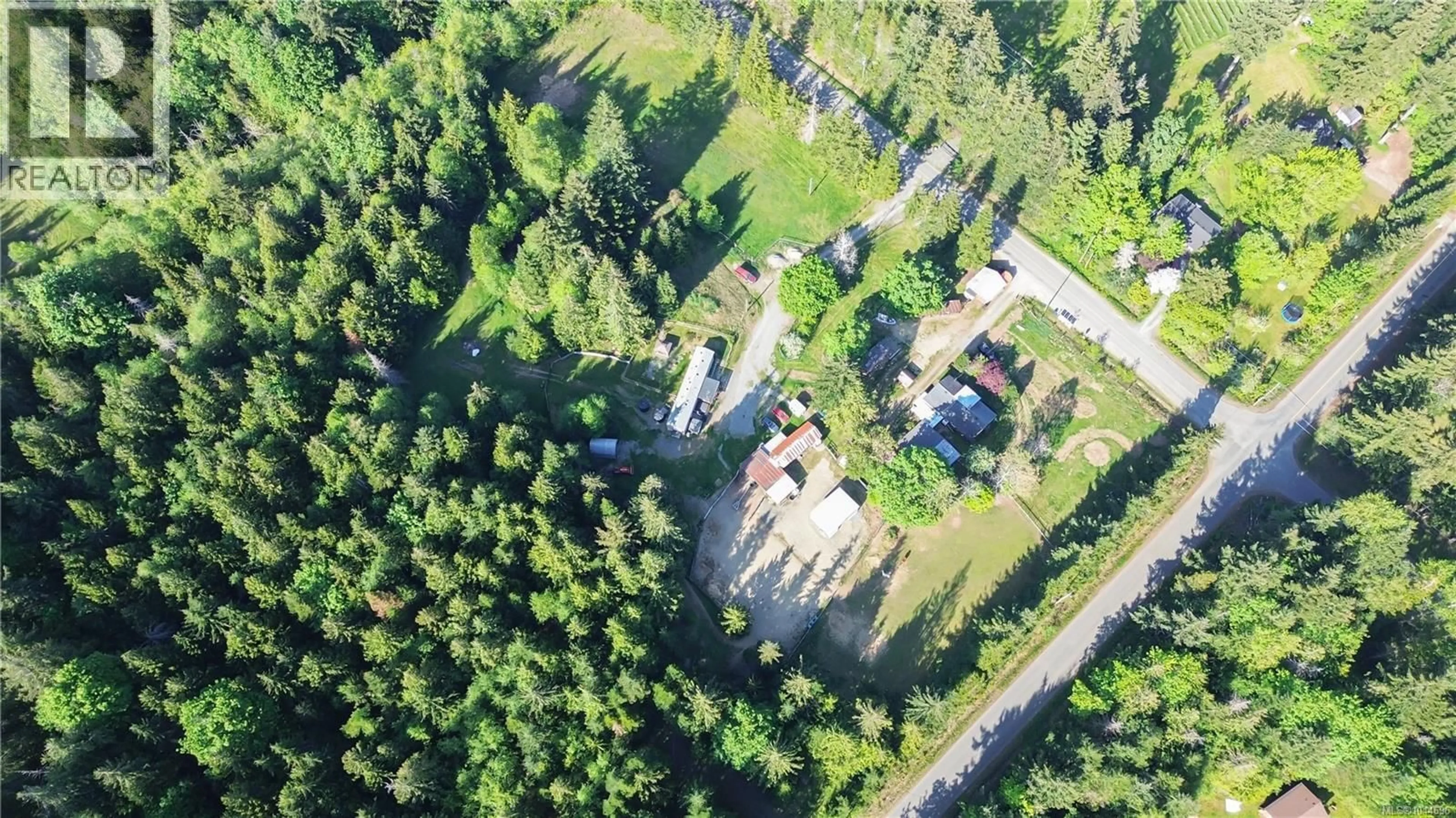 A pic from outside/outdoor area/front of a property/back of a property/a pic from drone, forest/trees view for 1341 PRATT ROAD, Hilliers British Columbia V9K1W7