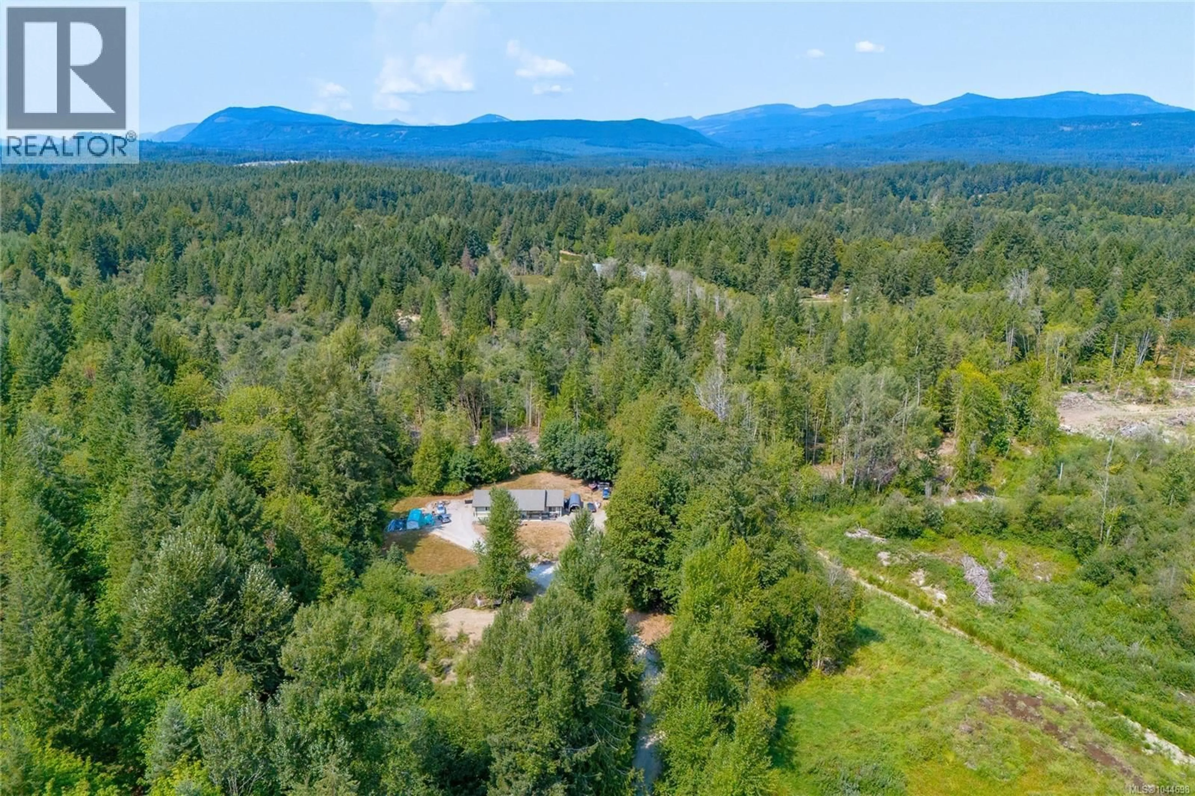A pic from outside/outdoor area/front of a property/back of a property/a pic from drone, forest/trees view for 4005 ROWE ROAD, Duncan British Columbia V9L6T1